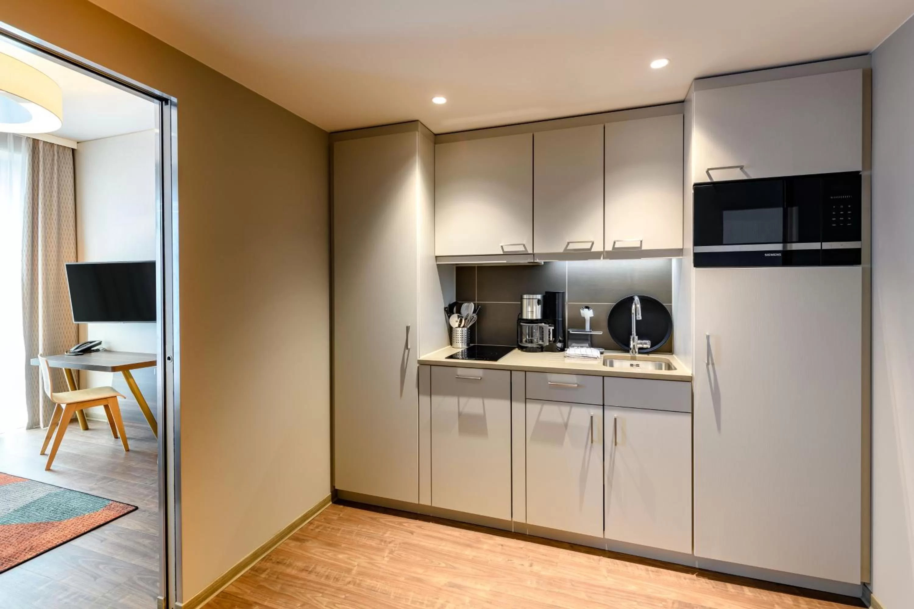 Kitchen or kitchenette in Aparthotel Adagio Bremen City