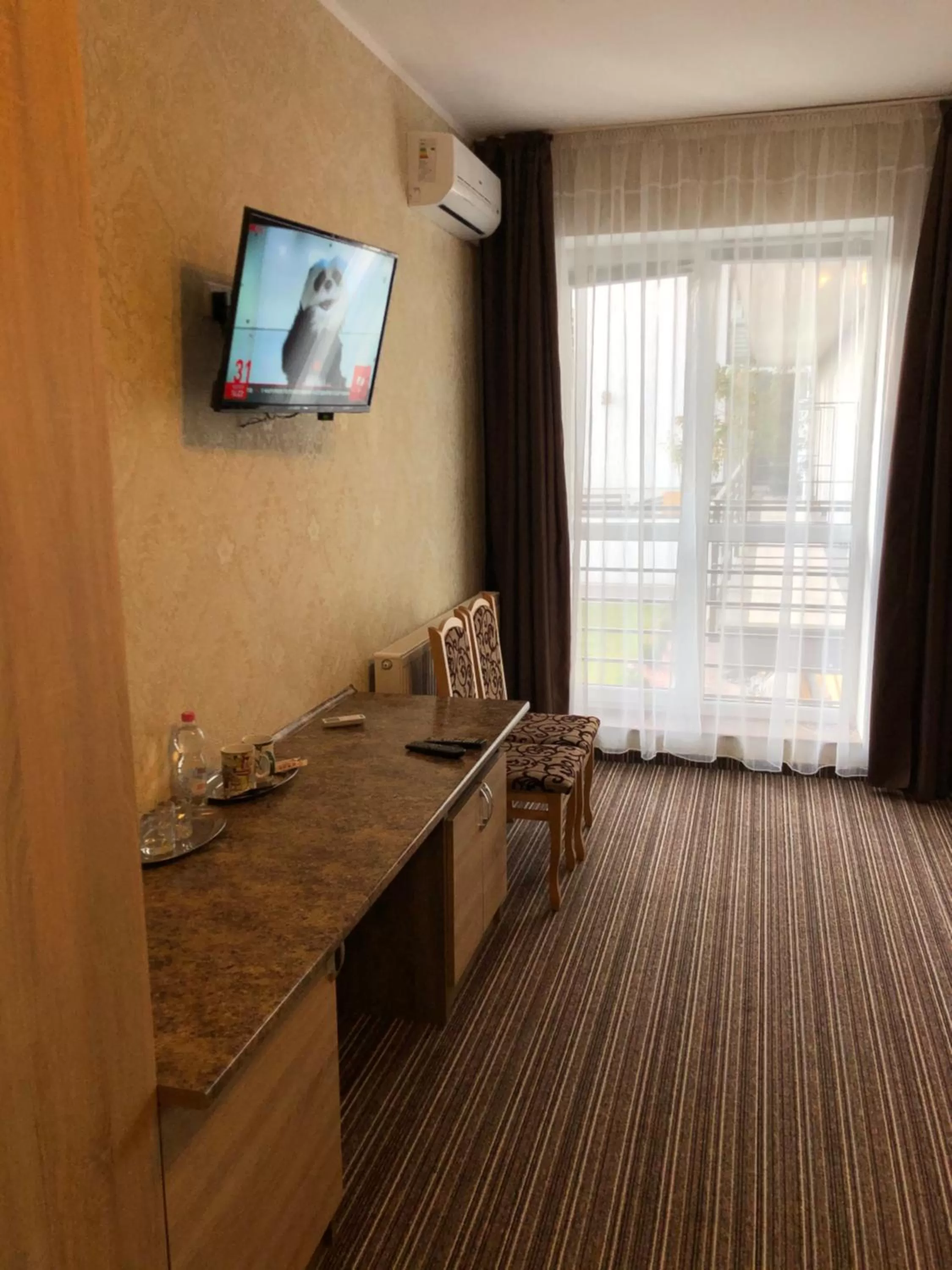TV/Entertainment Center in Motel Kurortnyy & SPA