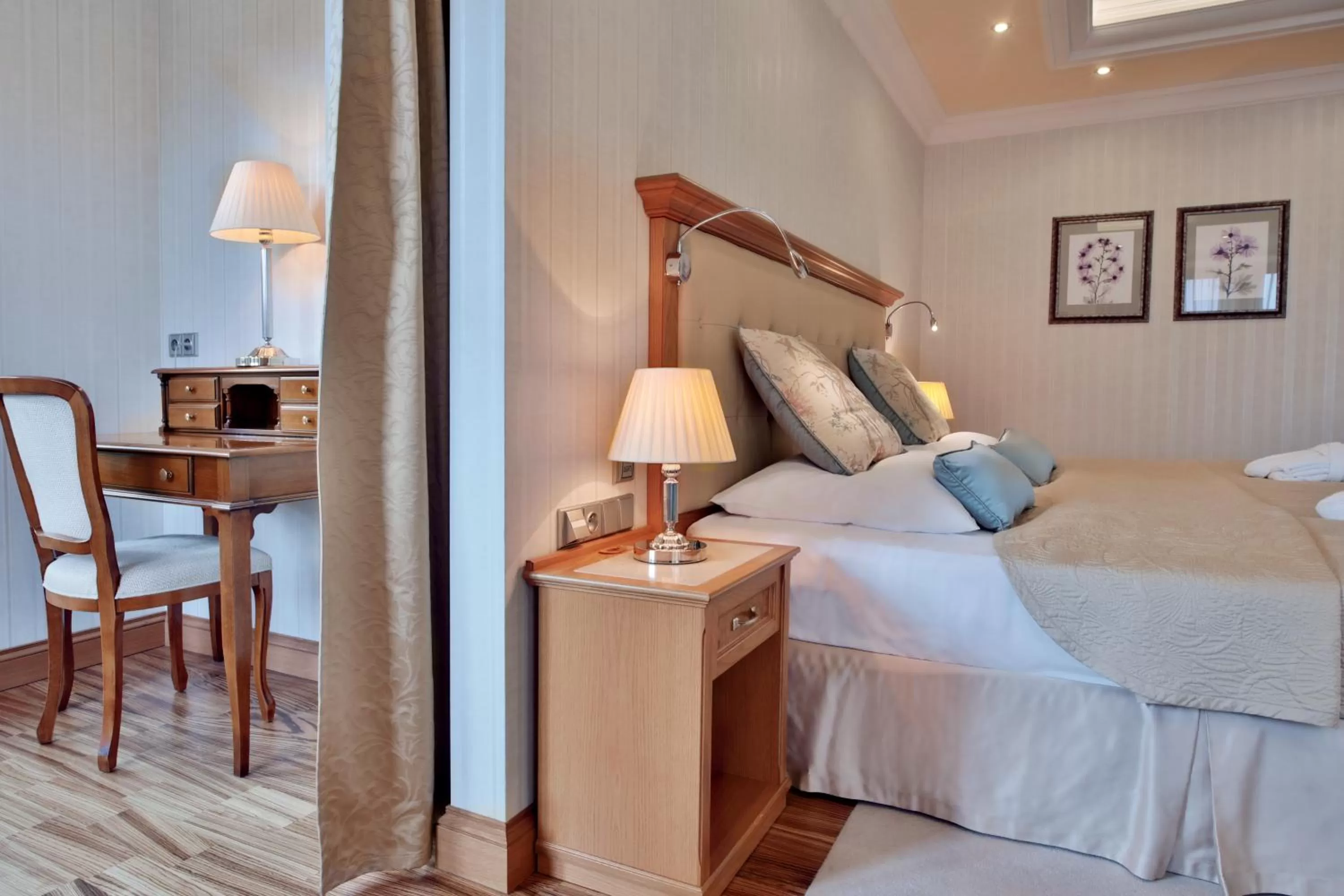 Seating area, Bed in Retro Riverside Wellness Resort