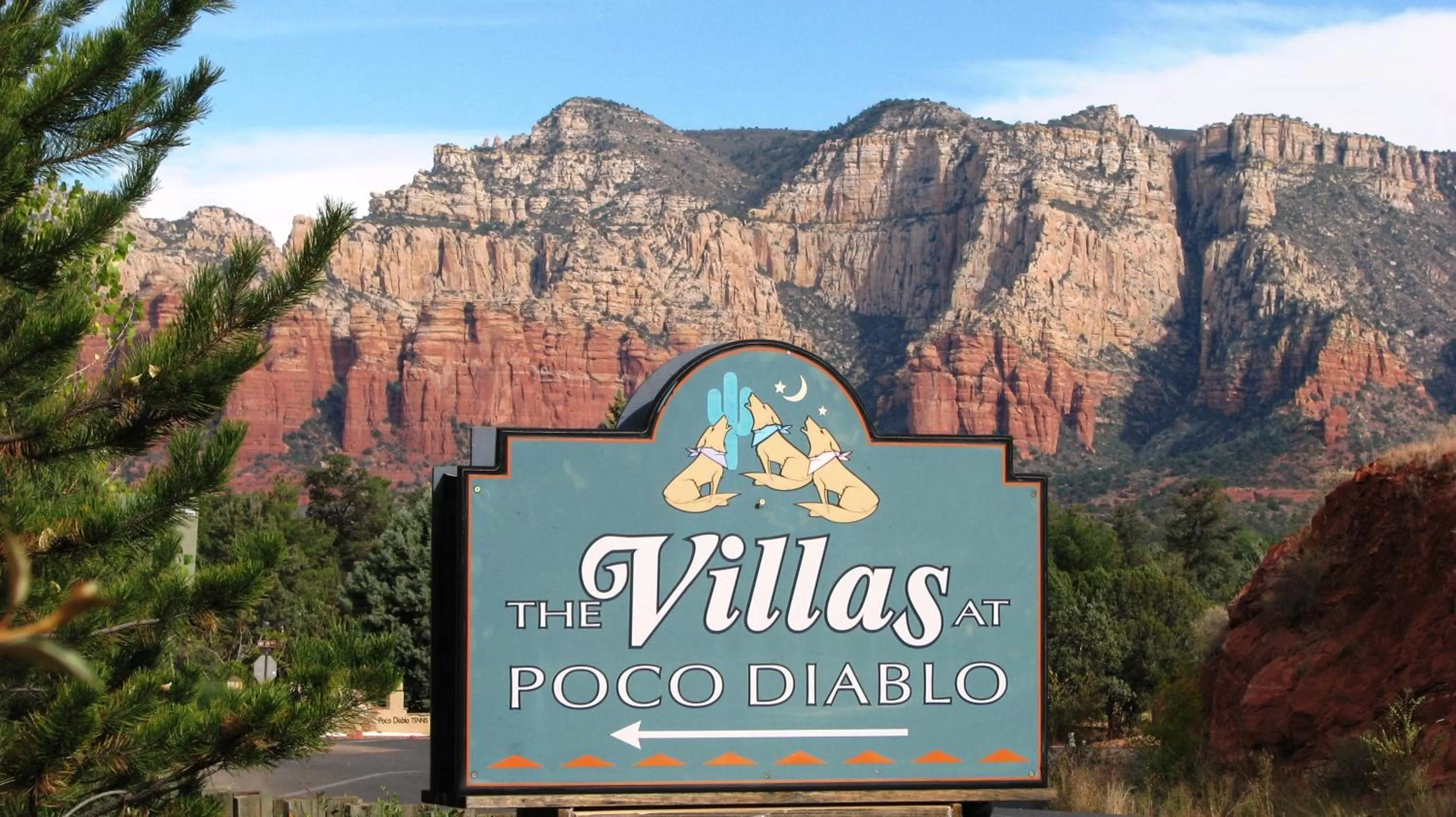 Property logo or sign in Villas at Poco Diablo