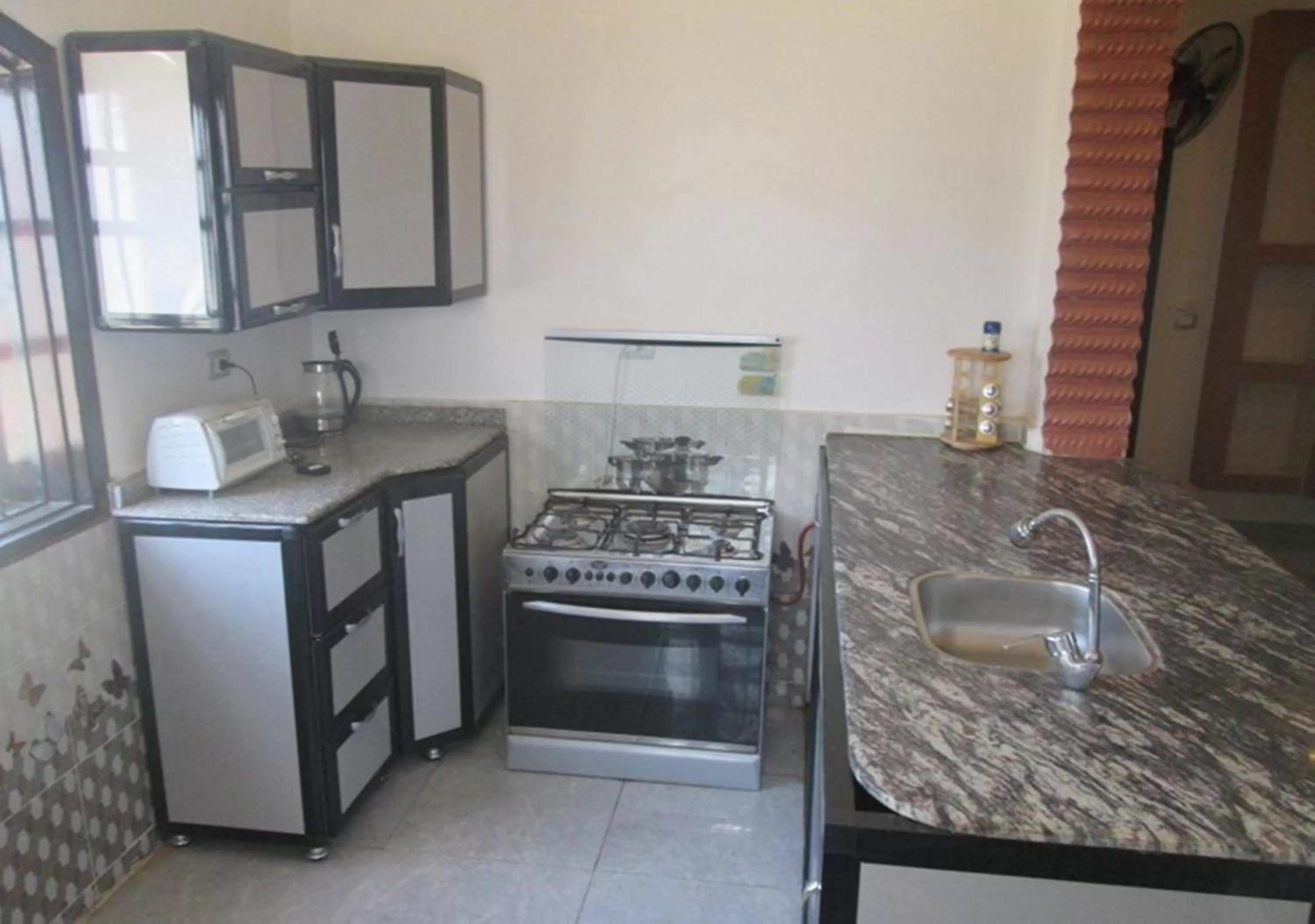 Swimming pool in Mama Africa Apts & Studios