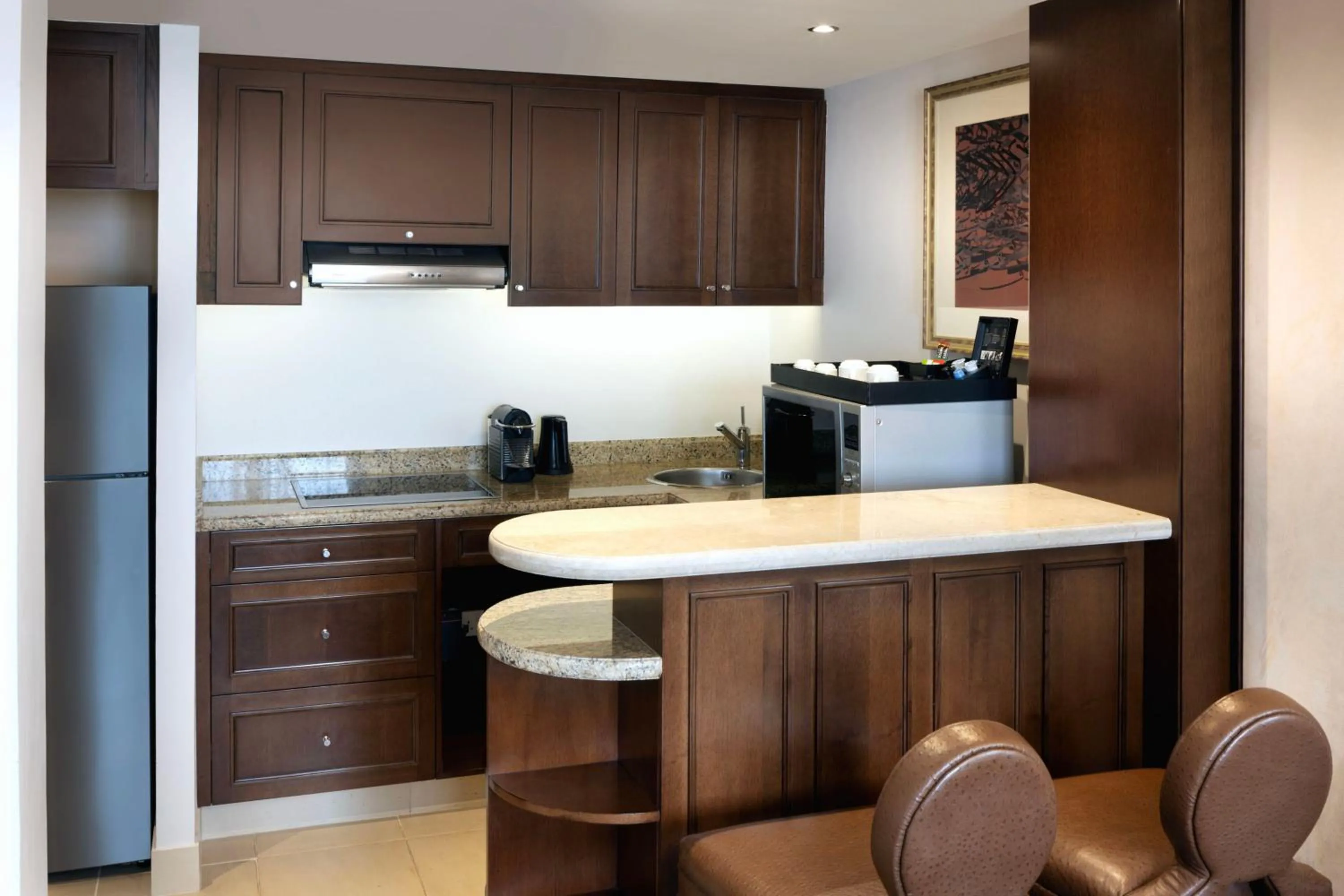 Kitchen or kitchenette in Sheraton Oman Hotel
