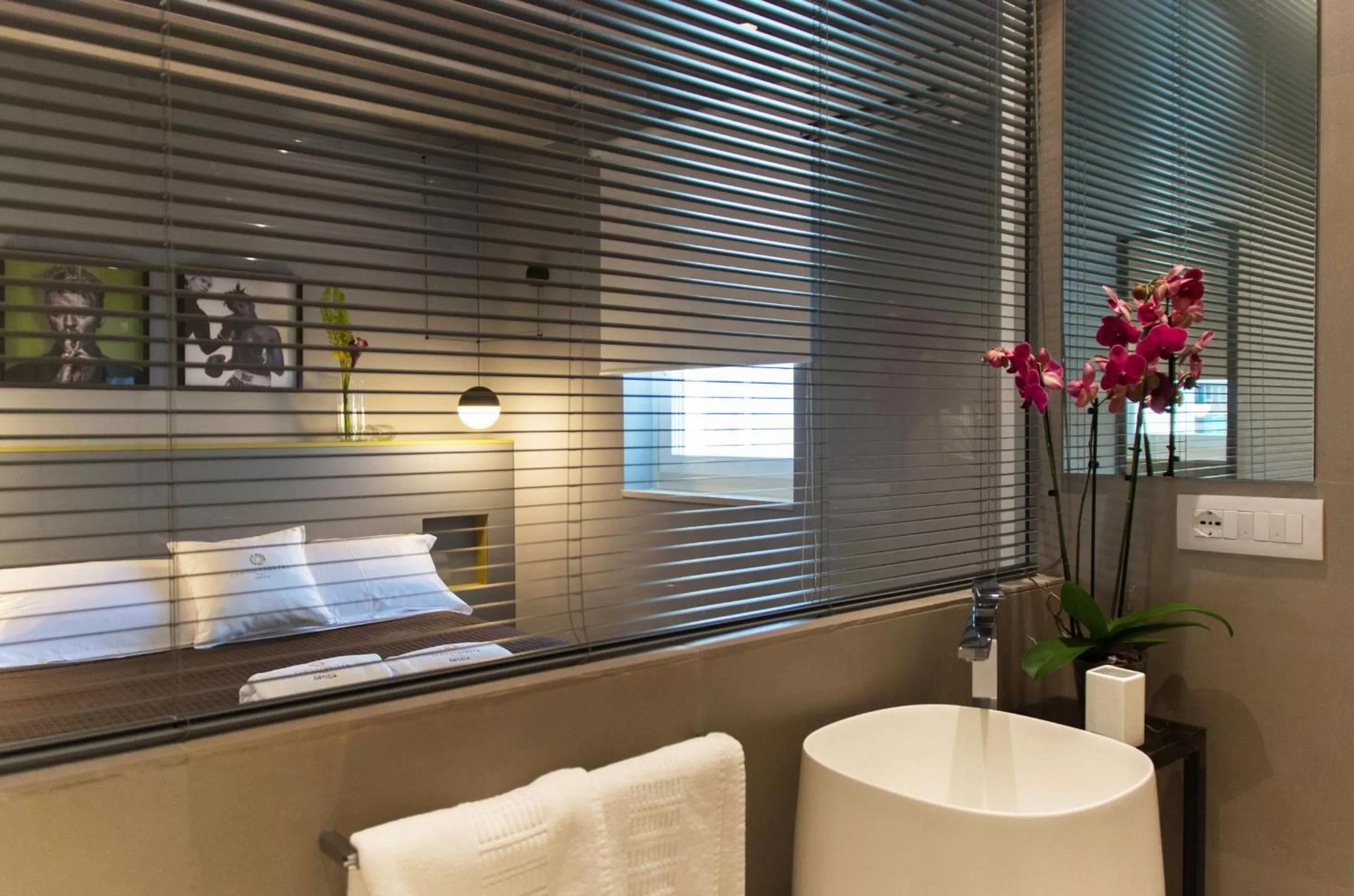 Bed in CinqueSuites Ortigia