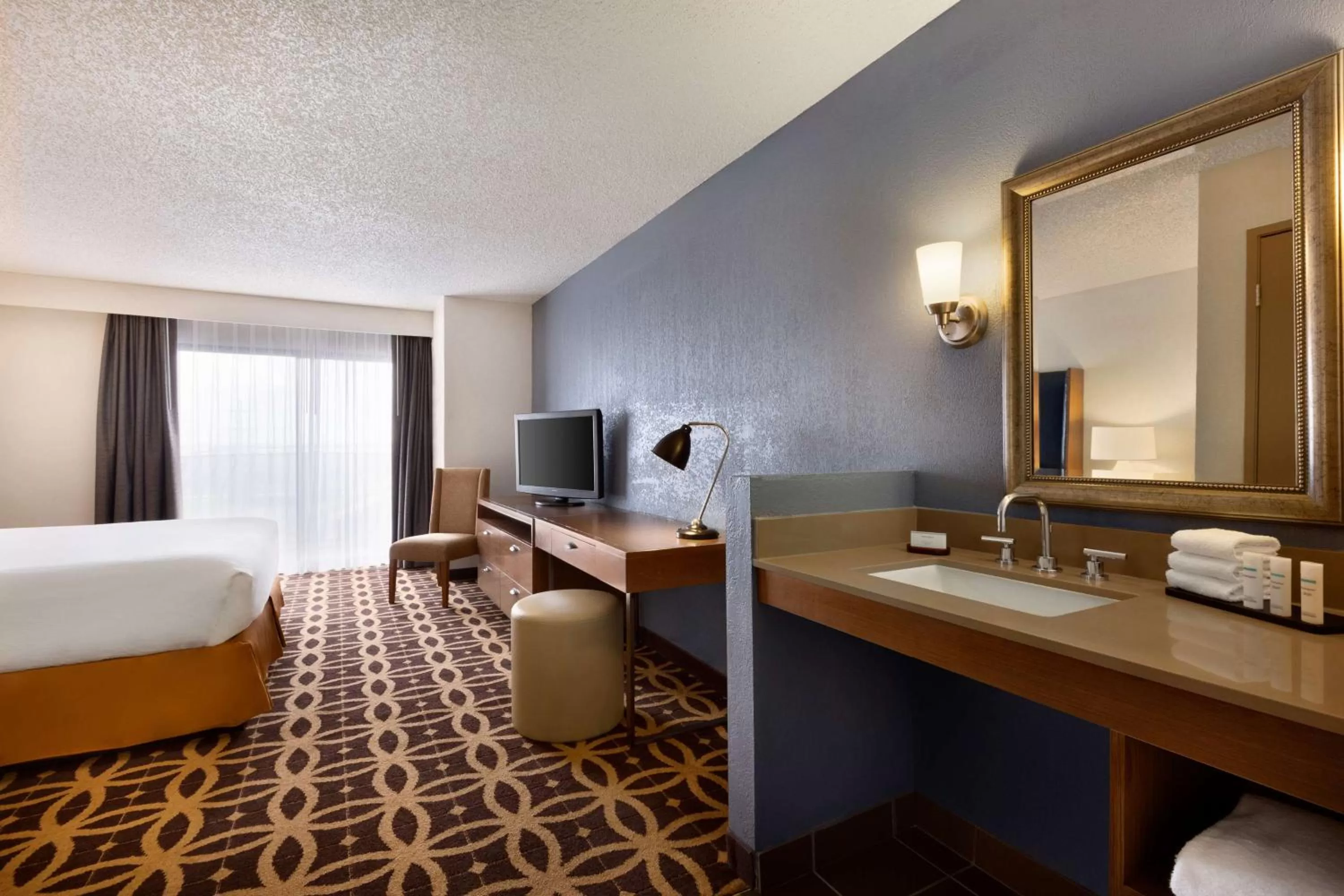 Bed in Embassy Suites by Hilton Dallas DFW Airport South