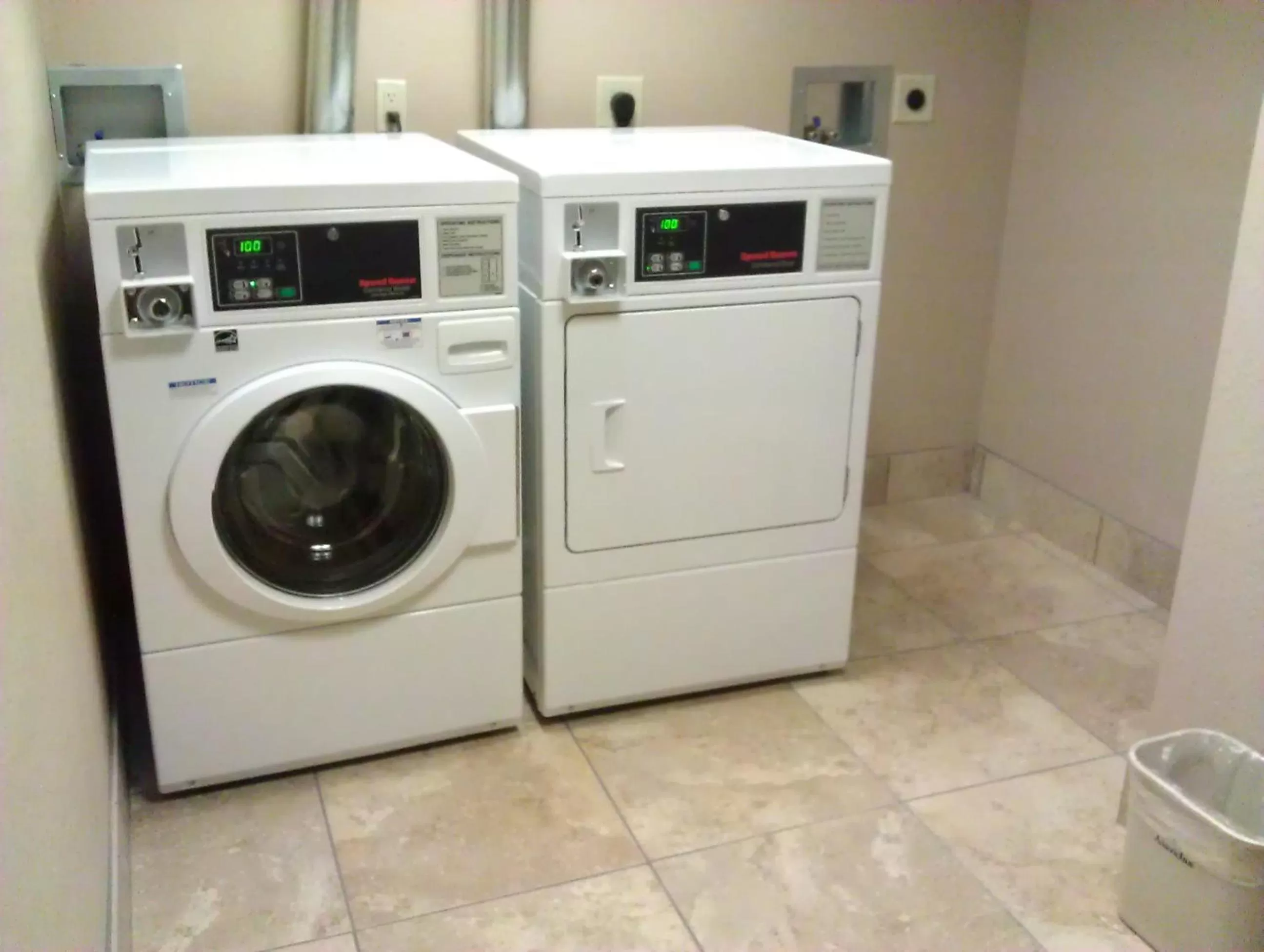 washing machine in AmericInn by Wyndham Omaha