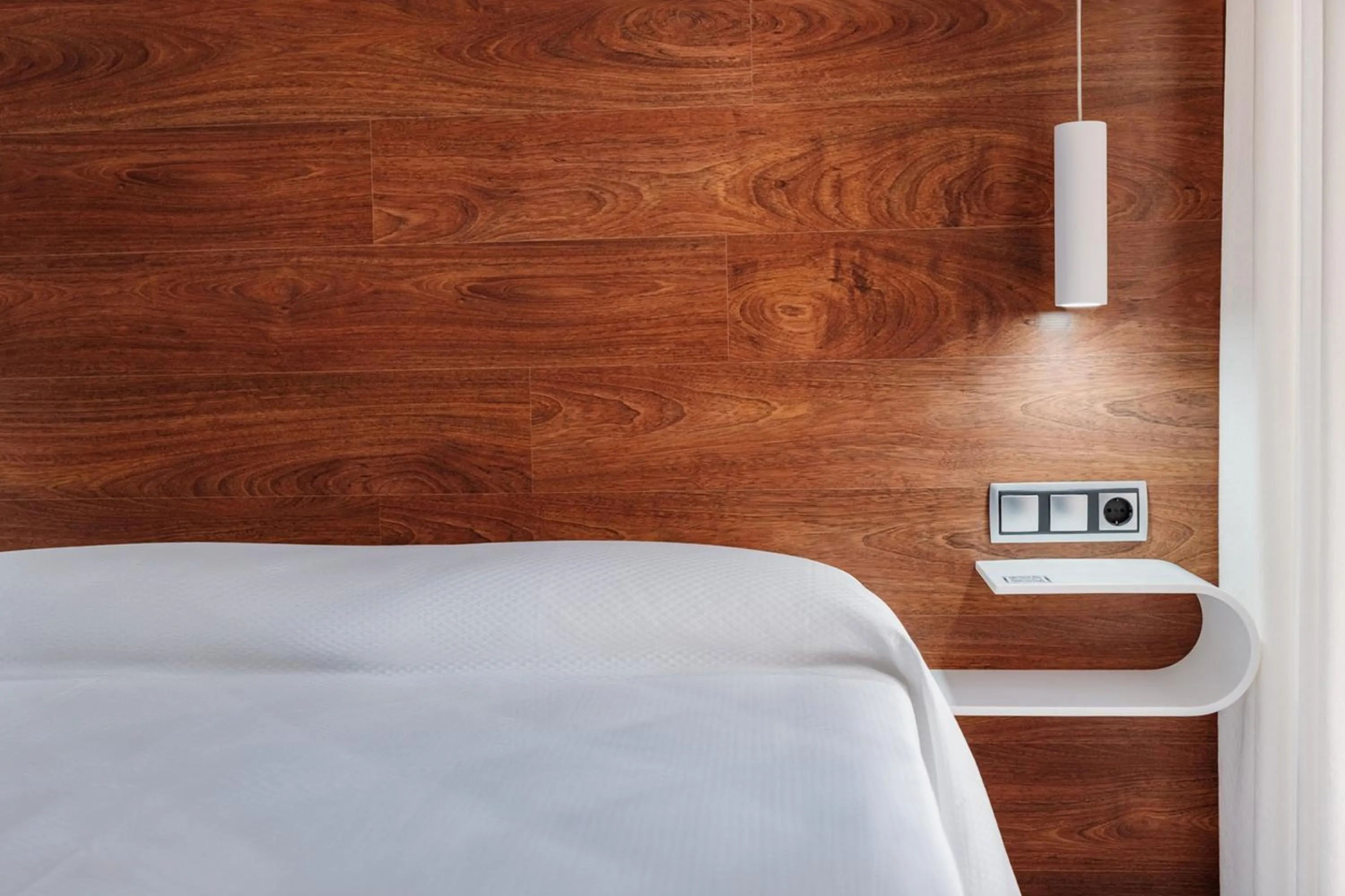 Bed in Hotel Los Delfines