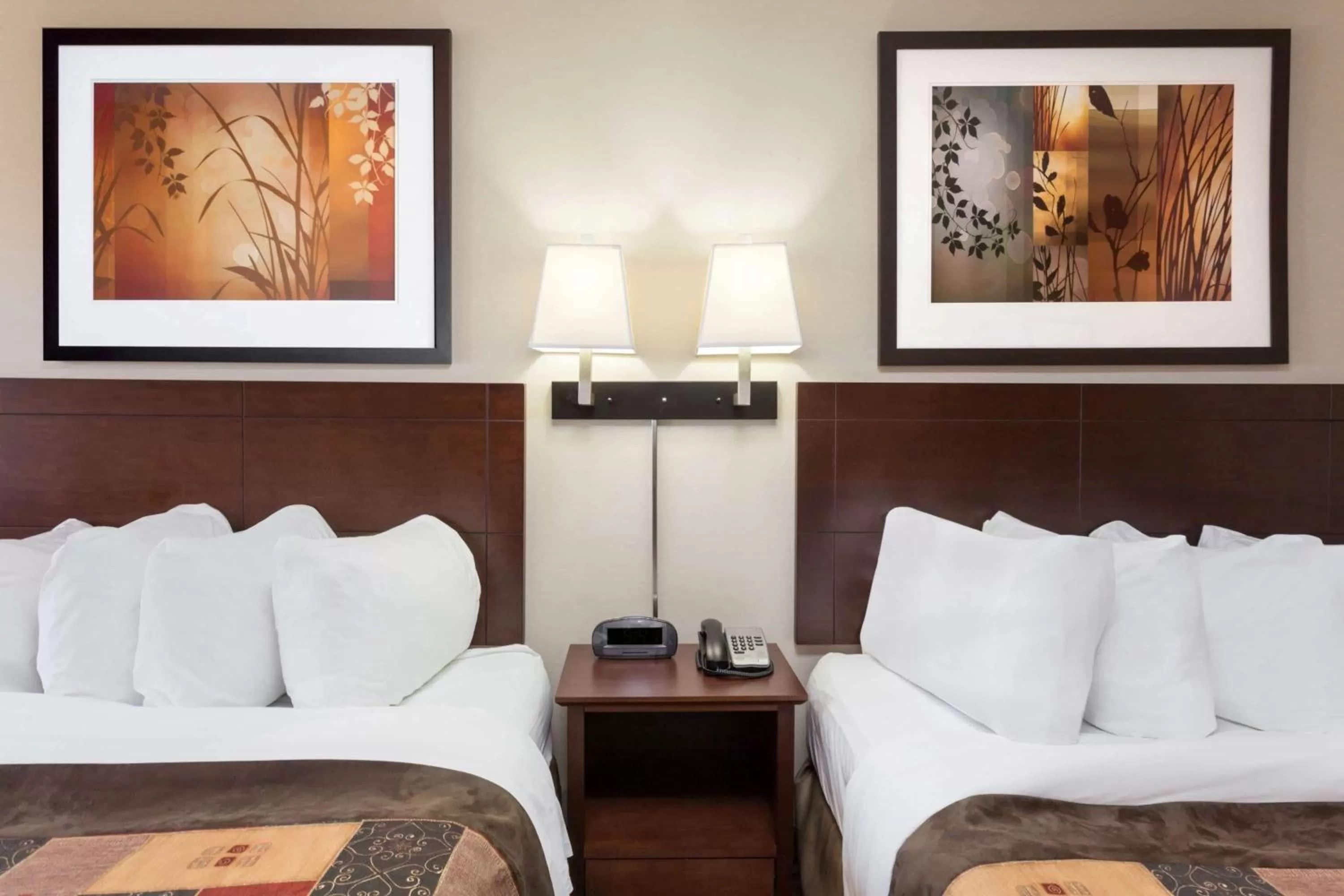 Photo of the whole room, Bed in Ramada by Wyndham Weyburn