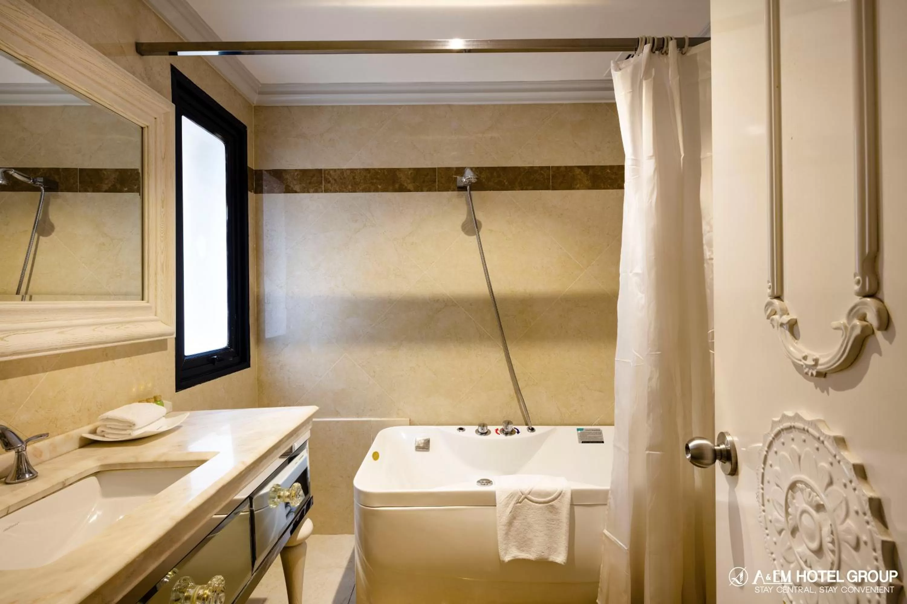 Bathroom in A&EM Saigon Hotel