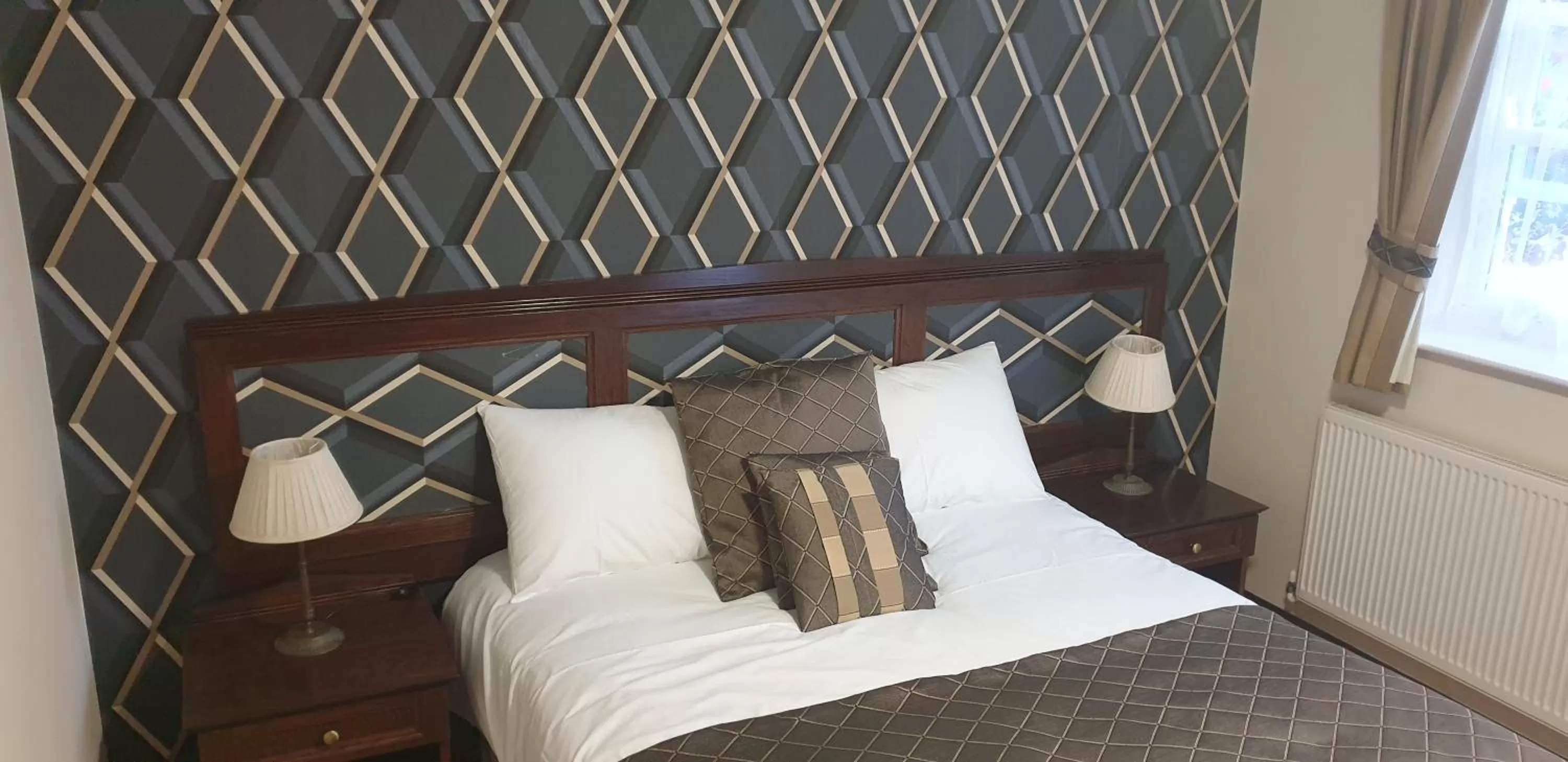 Bed in The Flying Bull Inn