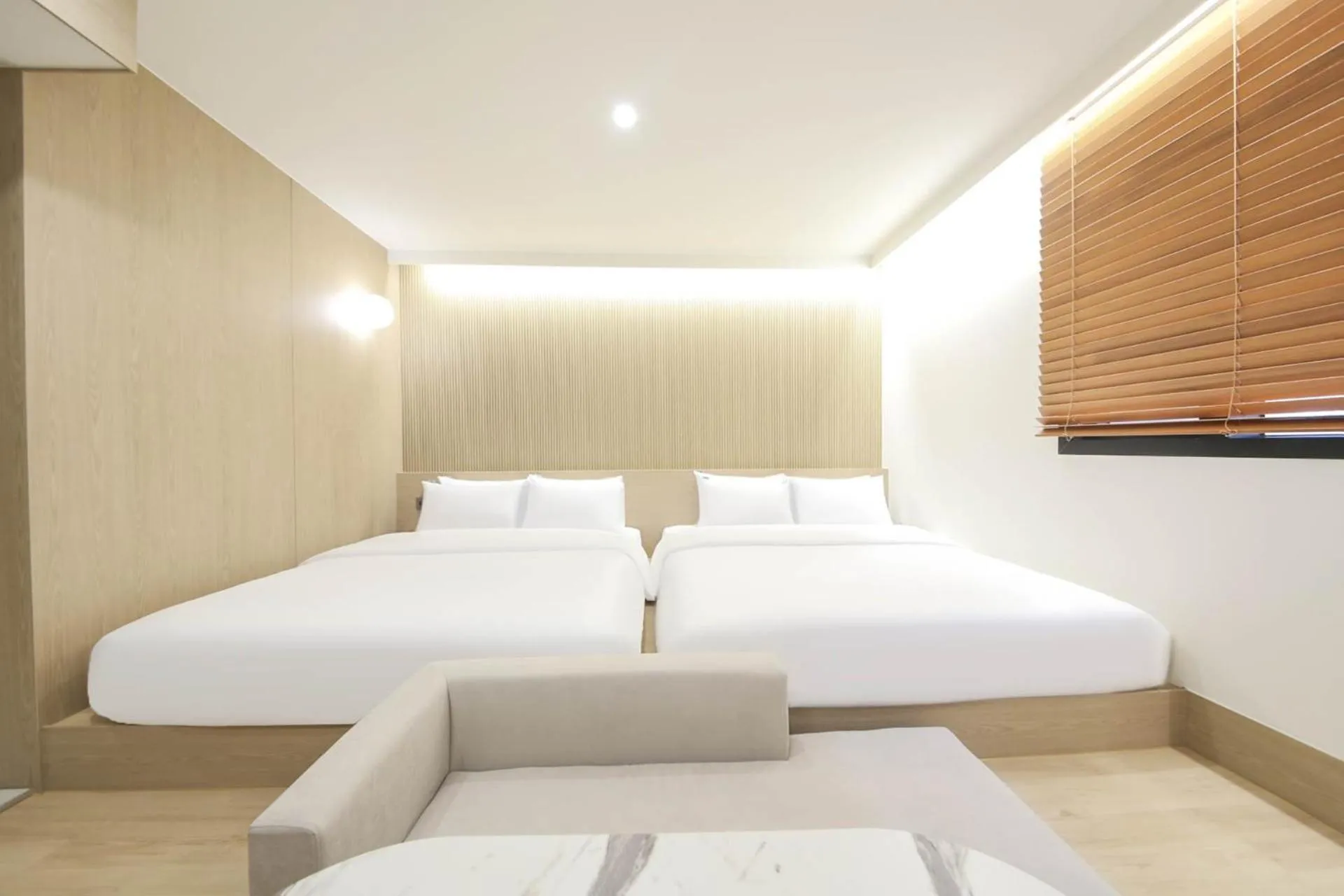 Bed in Jjak Boutique Hotel