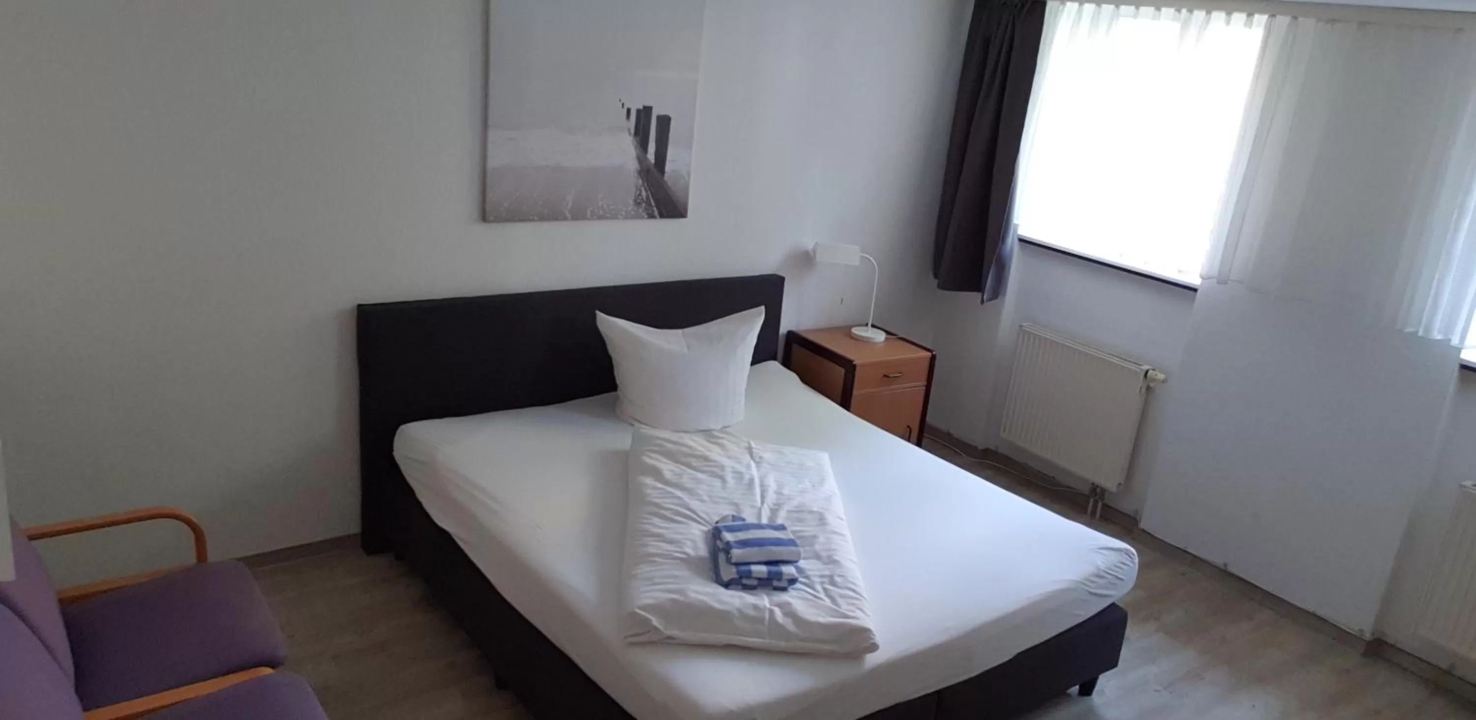 Bed in Appartement-Hotel Rostock