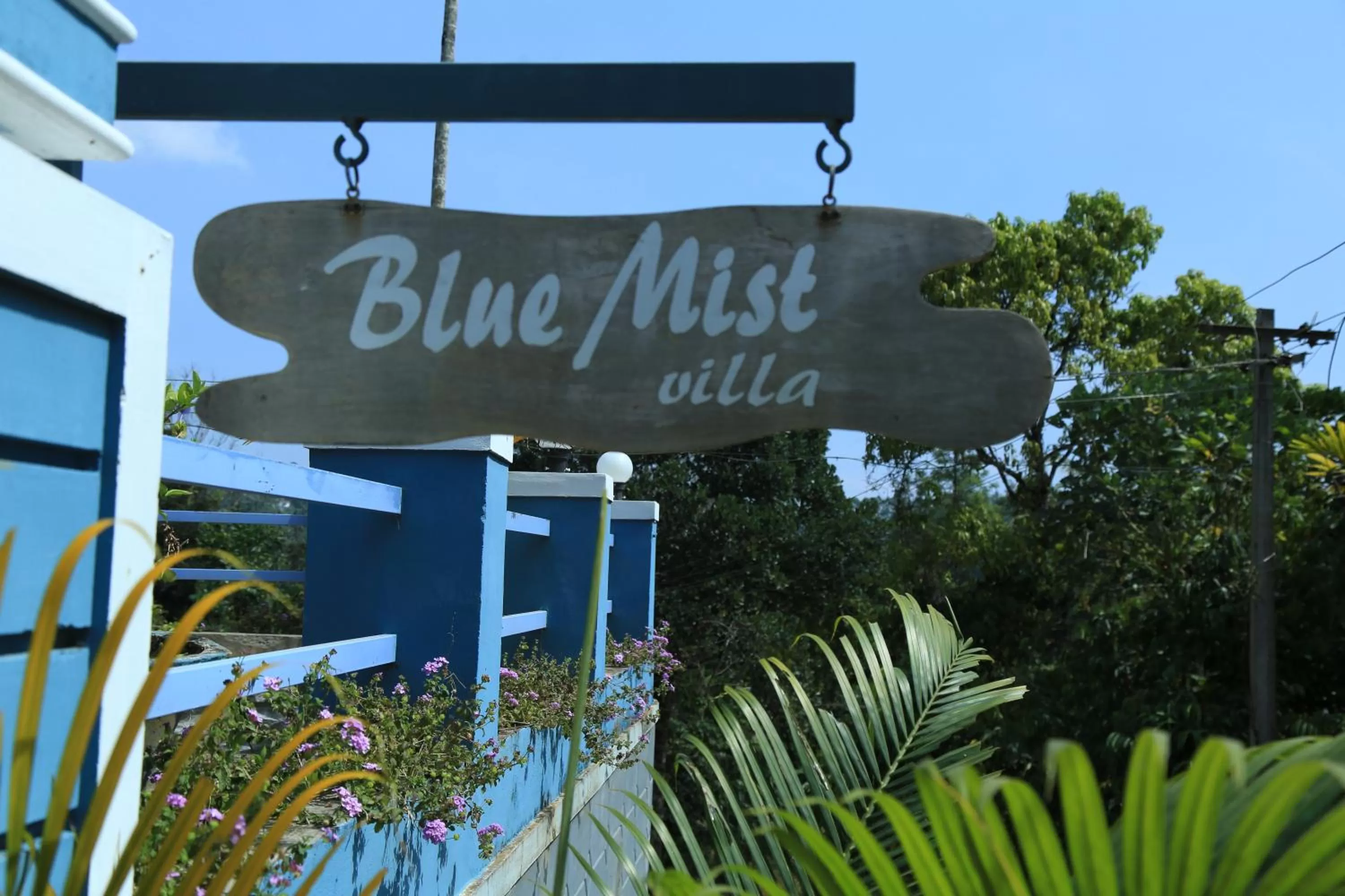 Property logo or sign in Munnar Blue Mist
