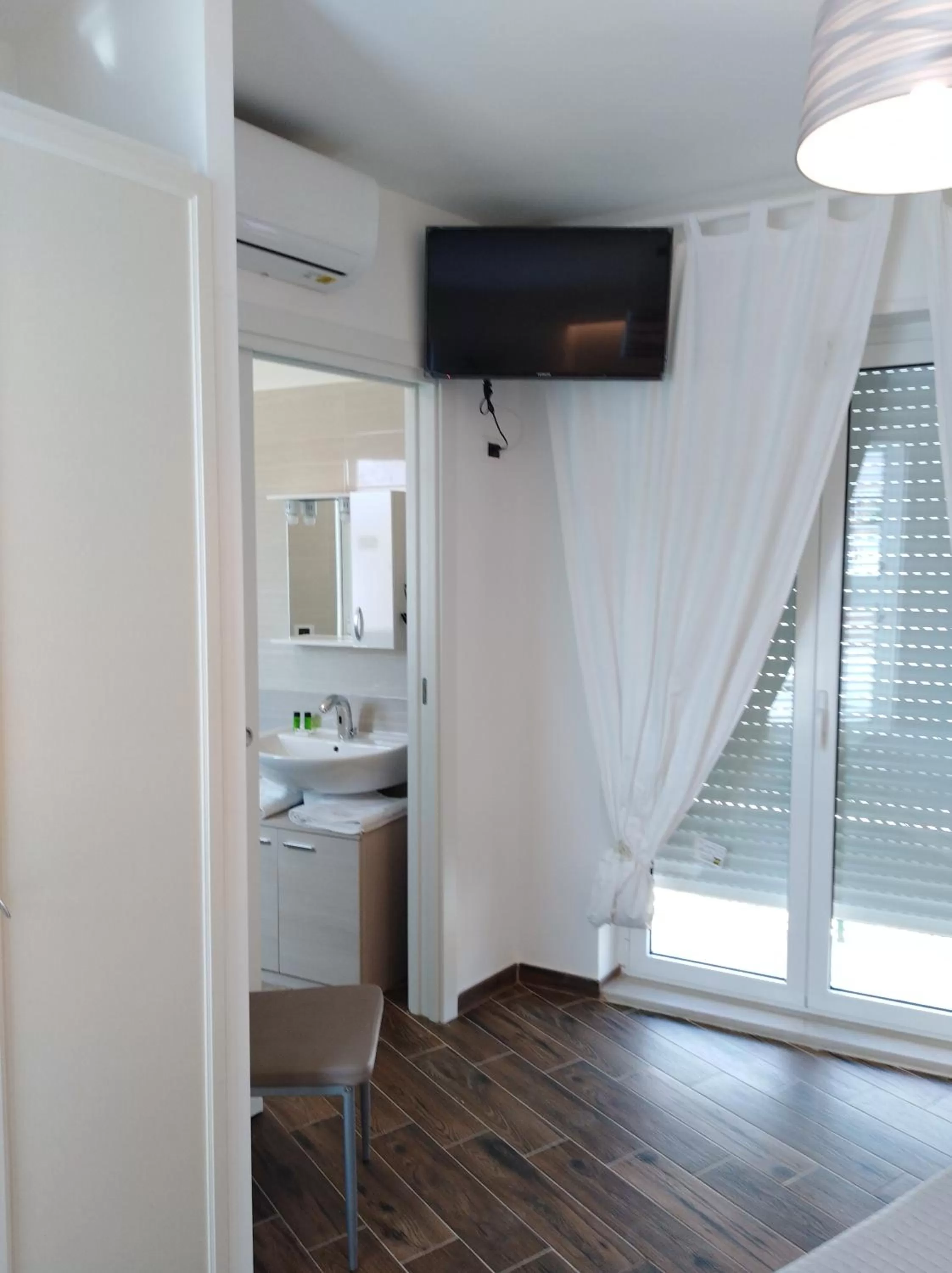 Photo of the whole room in DomuS al Corso B&B