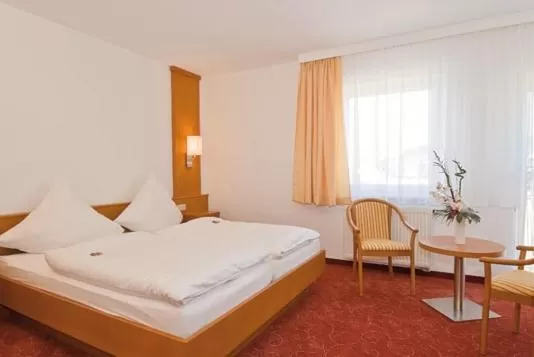 Bed in Hotel Zur Post