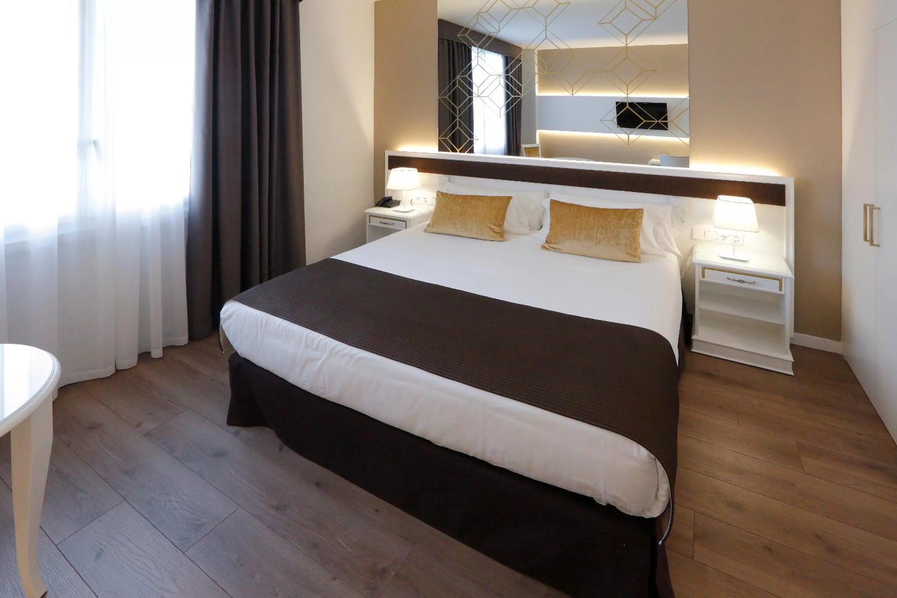 Bed in Sercotel Alfonso XIII