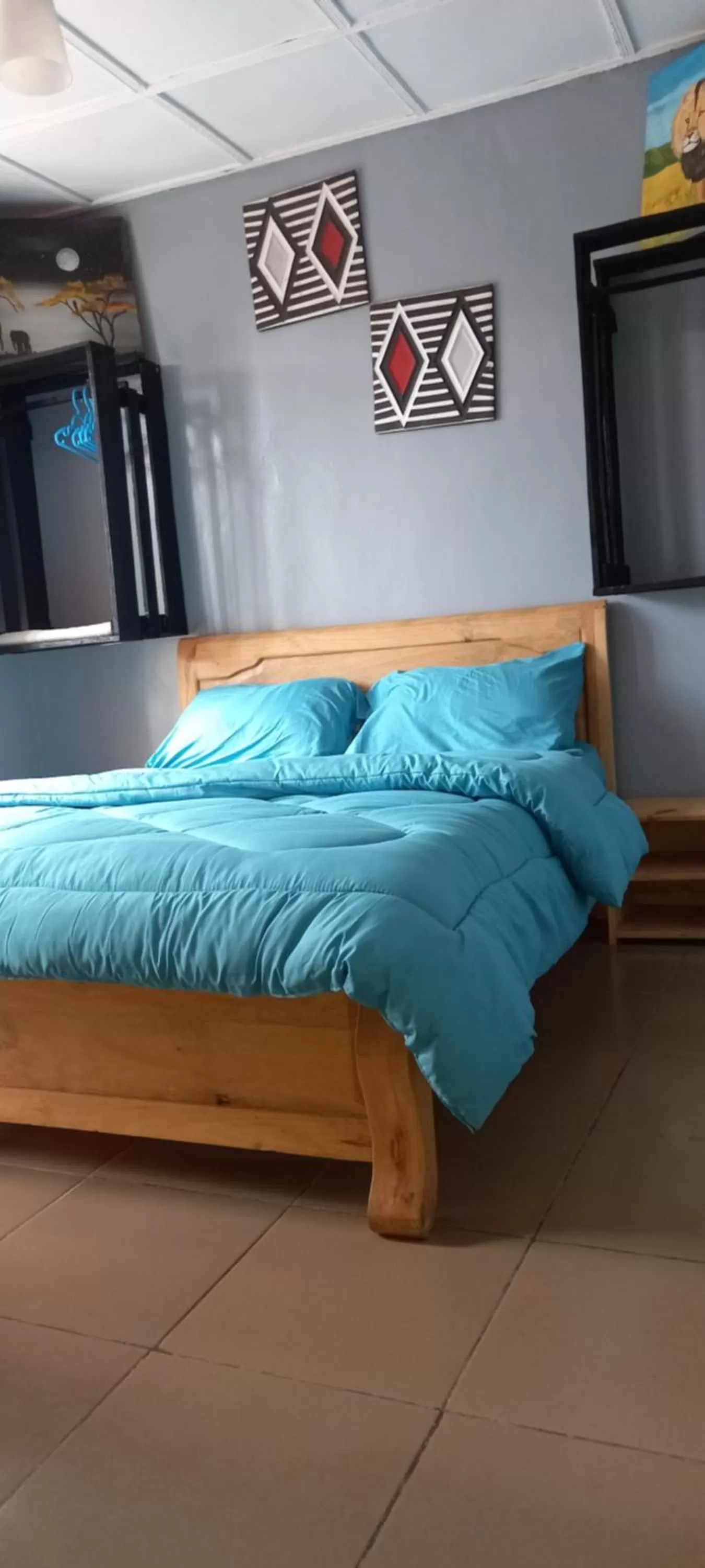 Bed in Tommy's Budget Rooms