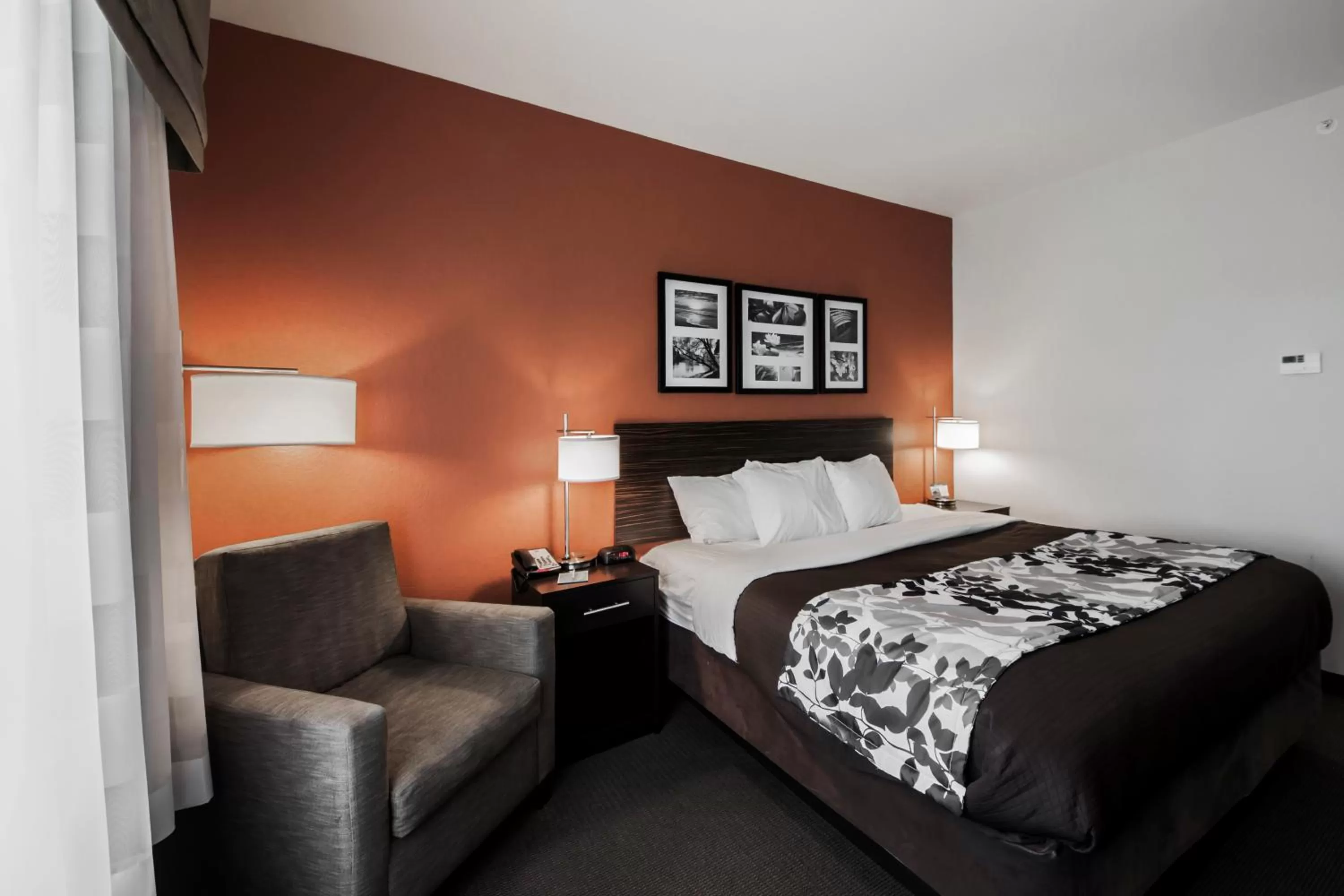 Bed in Sleep Inn & Suites Hennessey