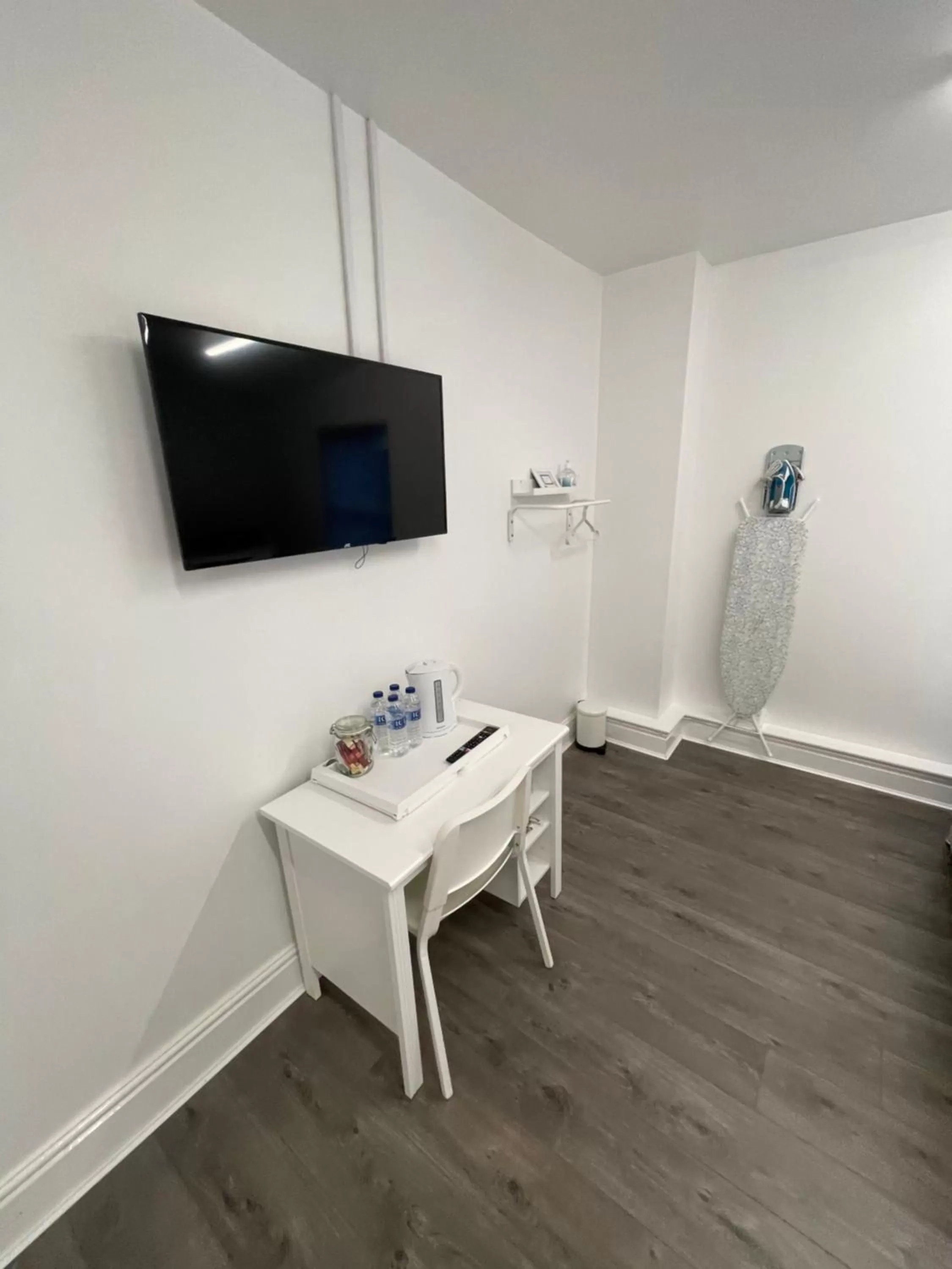 TV/Entertainment Center in County road rooms