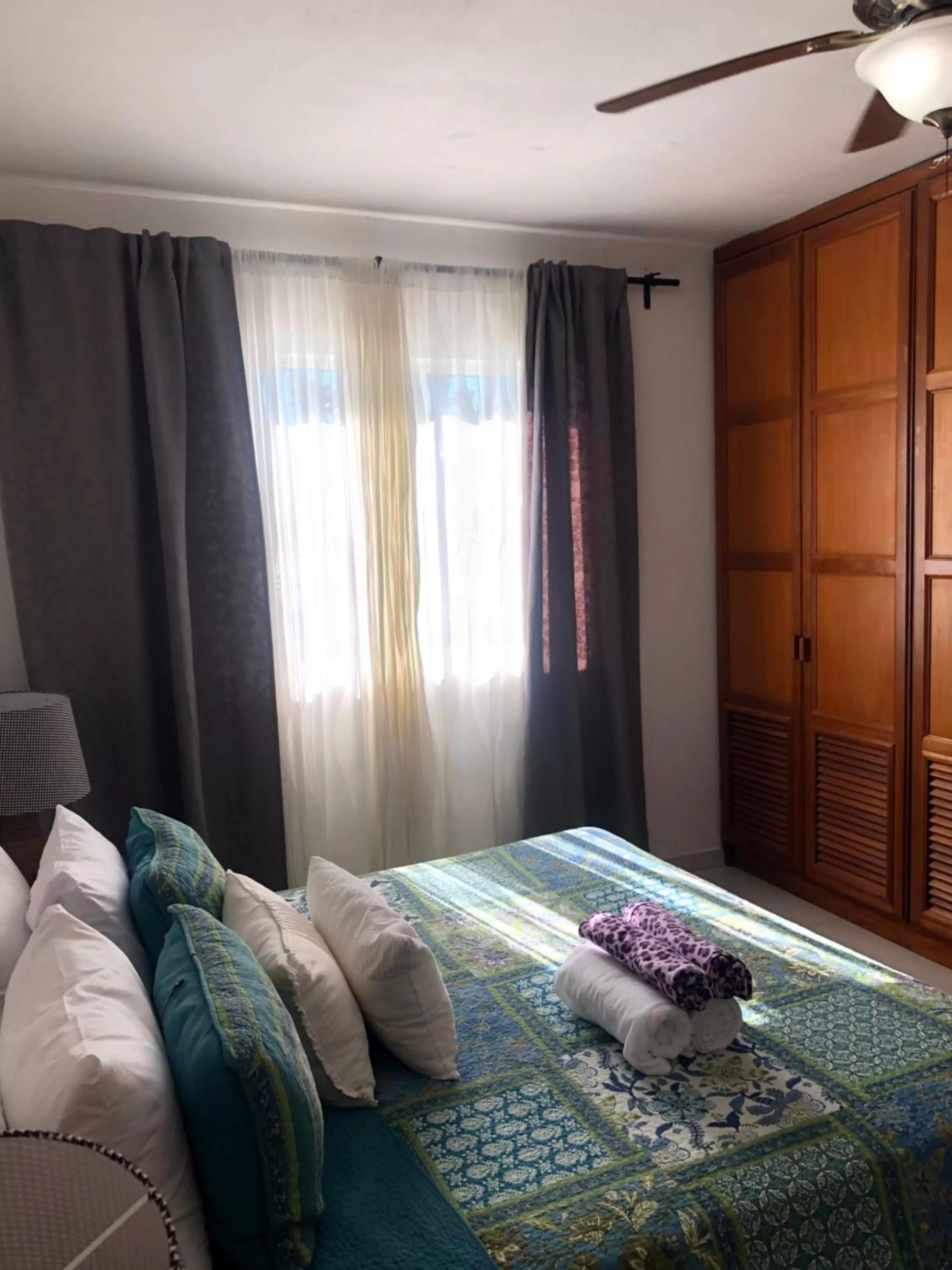 Bed in Los Corales Luxury Villas Beach Club and Spa