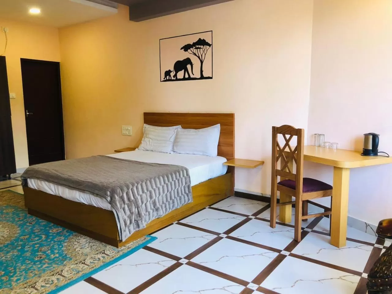 Bed, Room Photo in Udaya Resort