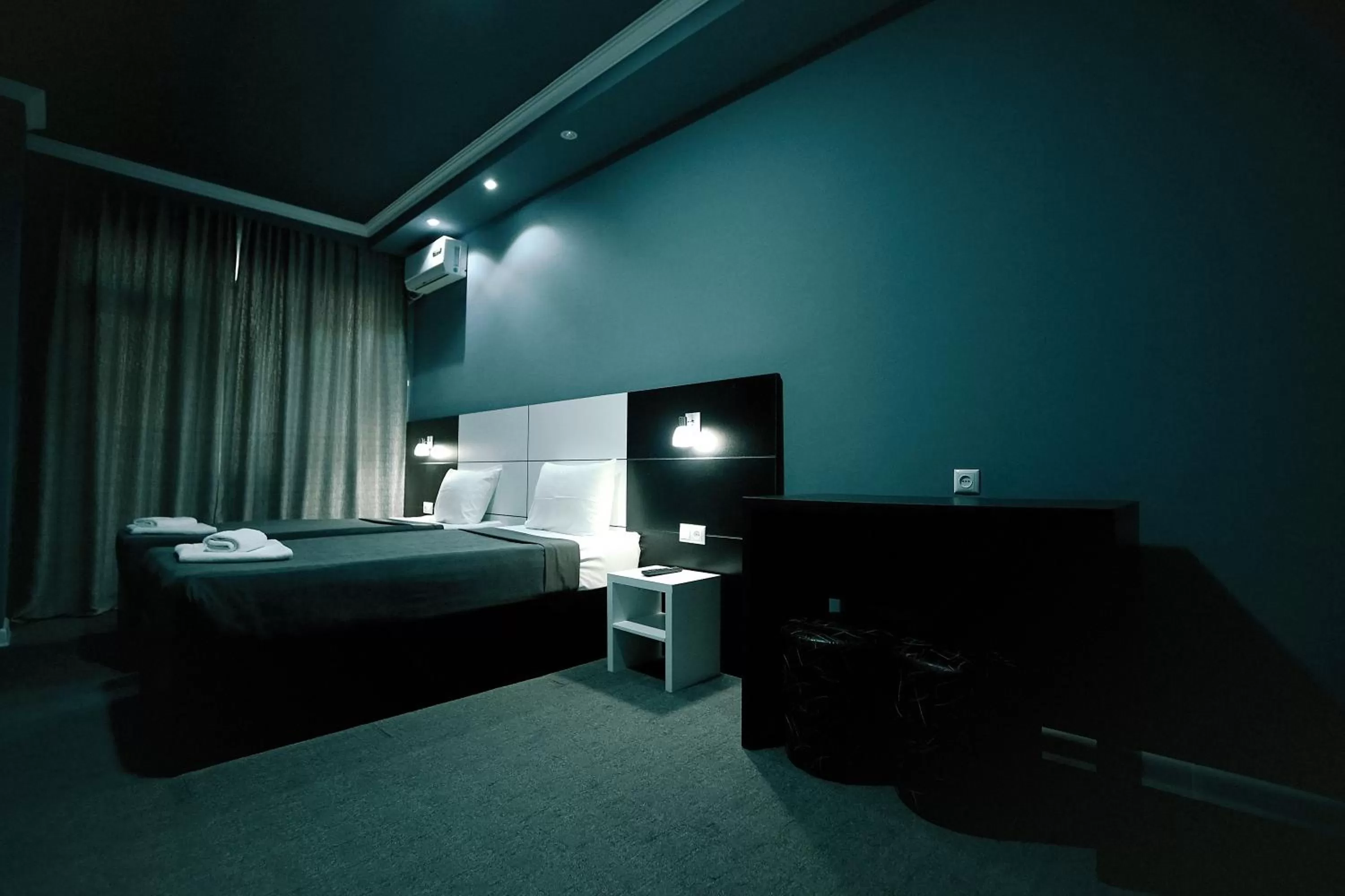 Bed, TV/Entertainment Center in Hotel Rero