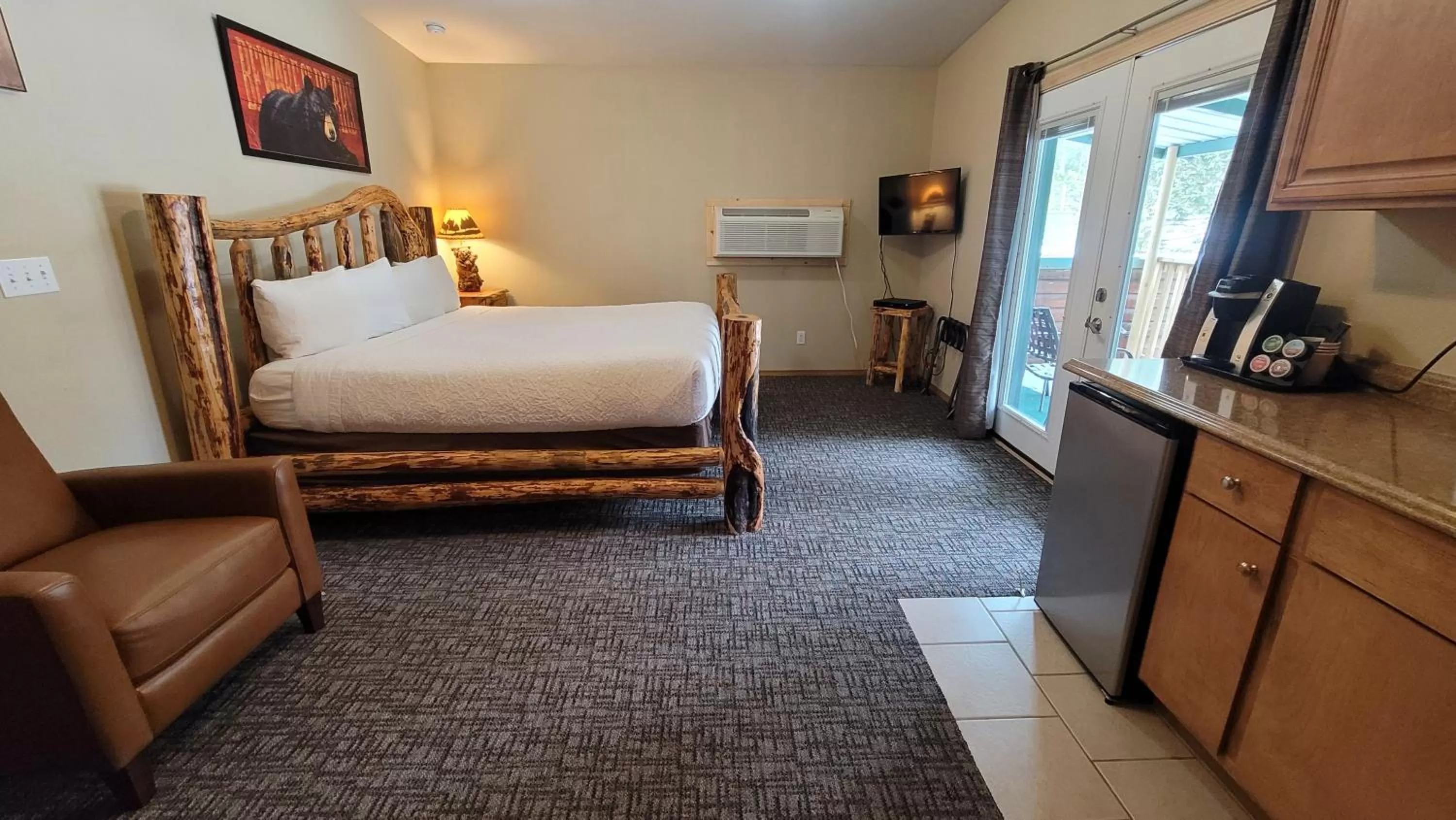 Bed in Riverfront Motel & Cabins