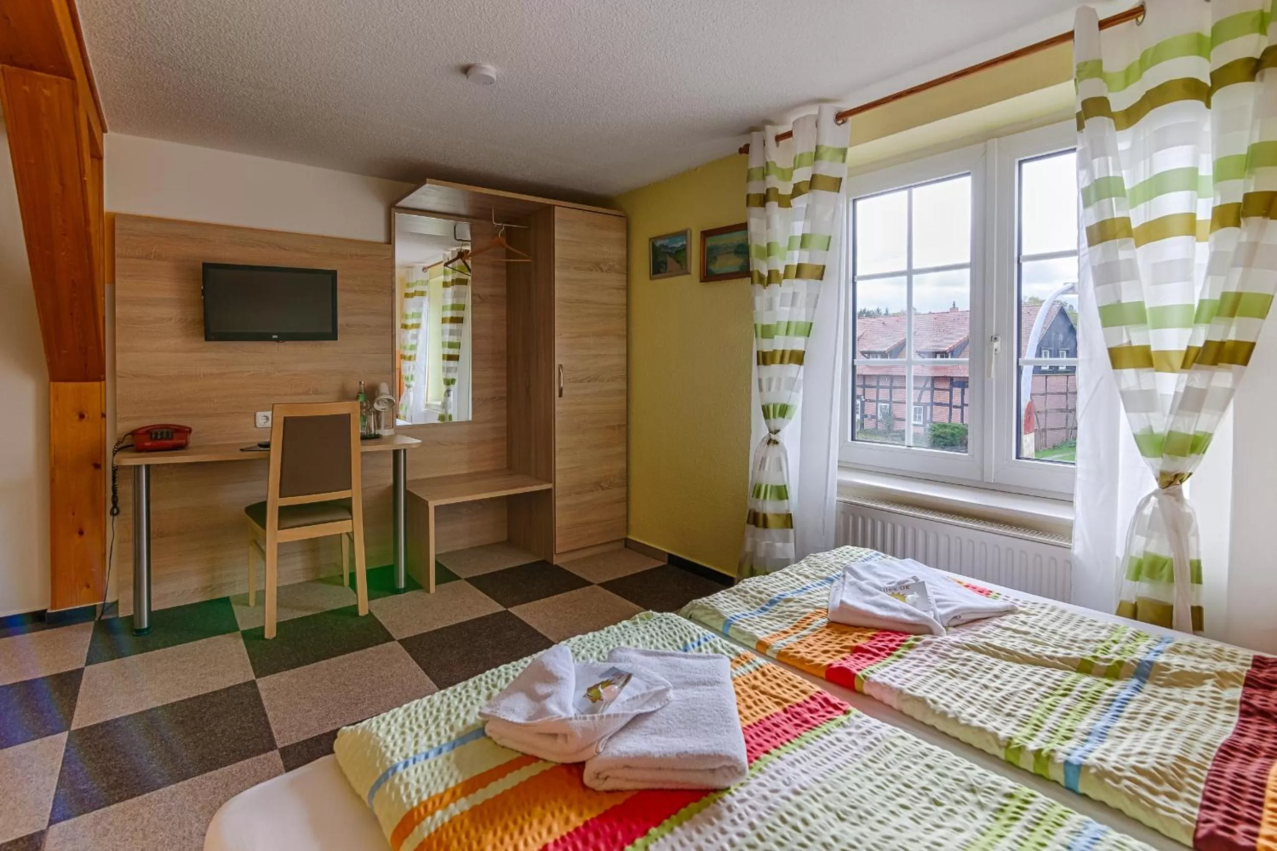 Photo of the whole room, Bed in Landhotel & Brauhaus Prignitzer Hof