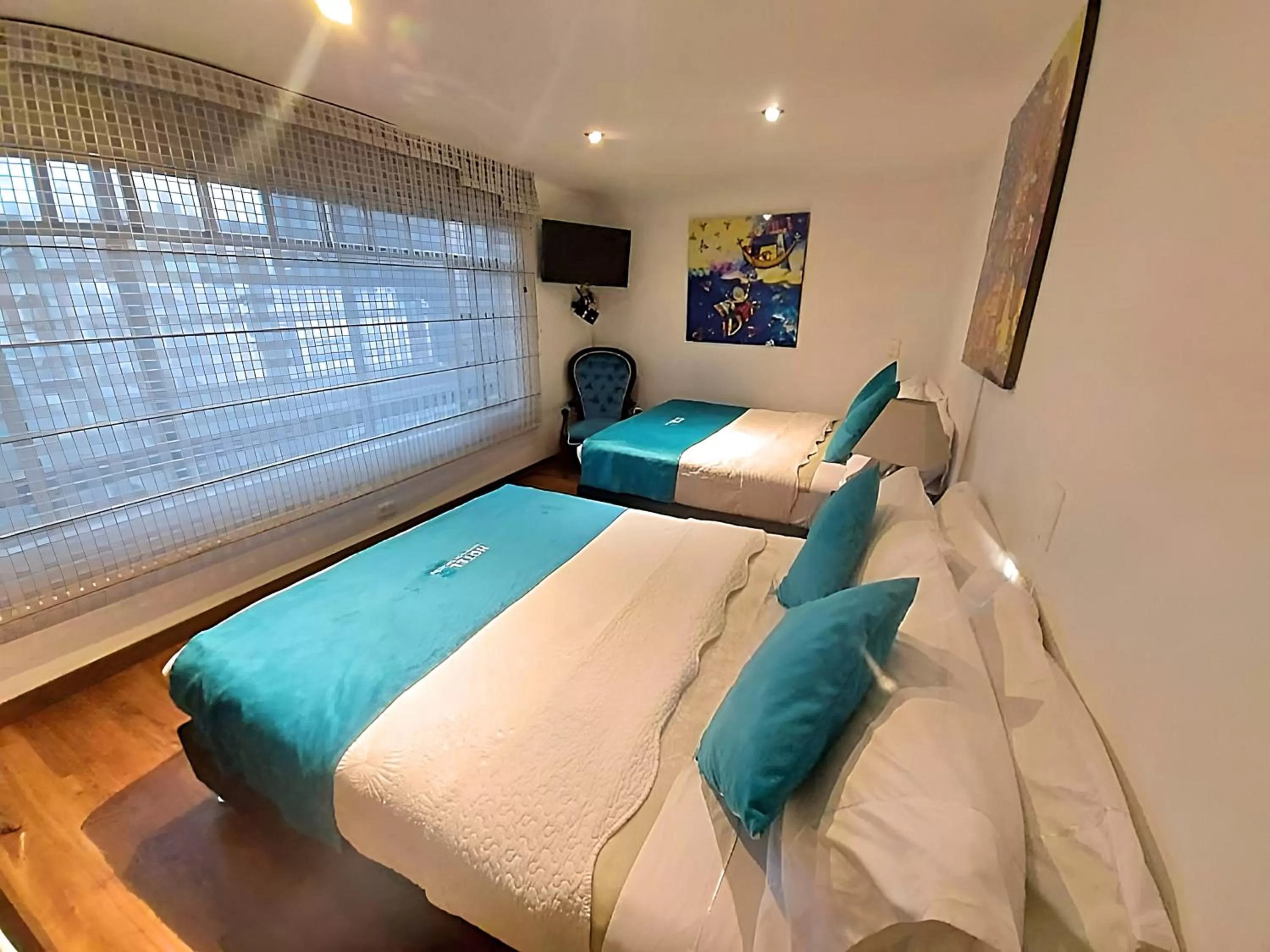 Photo of the whole room, Bed in Hotel Santa Cruz Bogotá