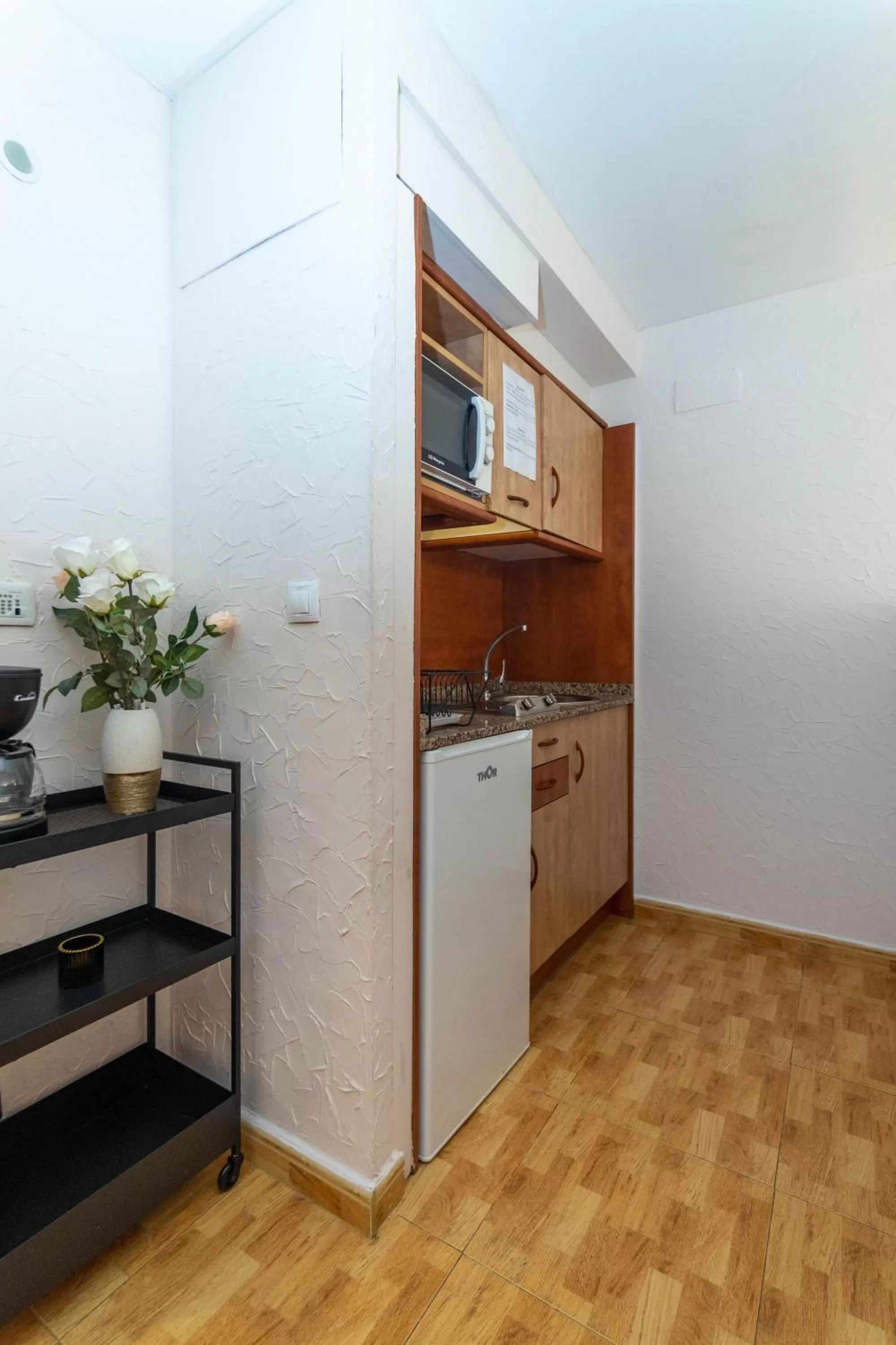 Kitchen or kitchenette in Unique Hotel Apartments