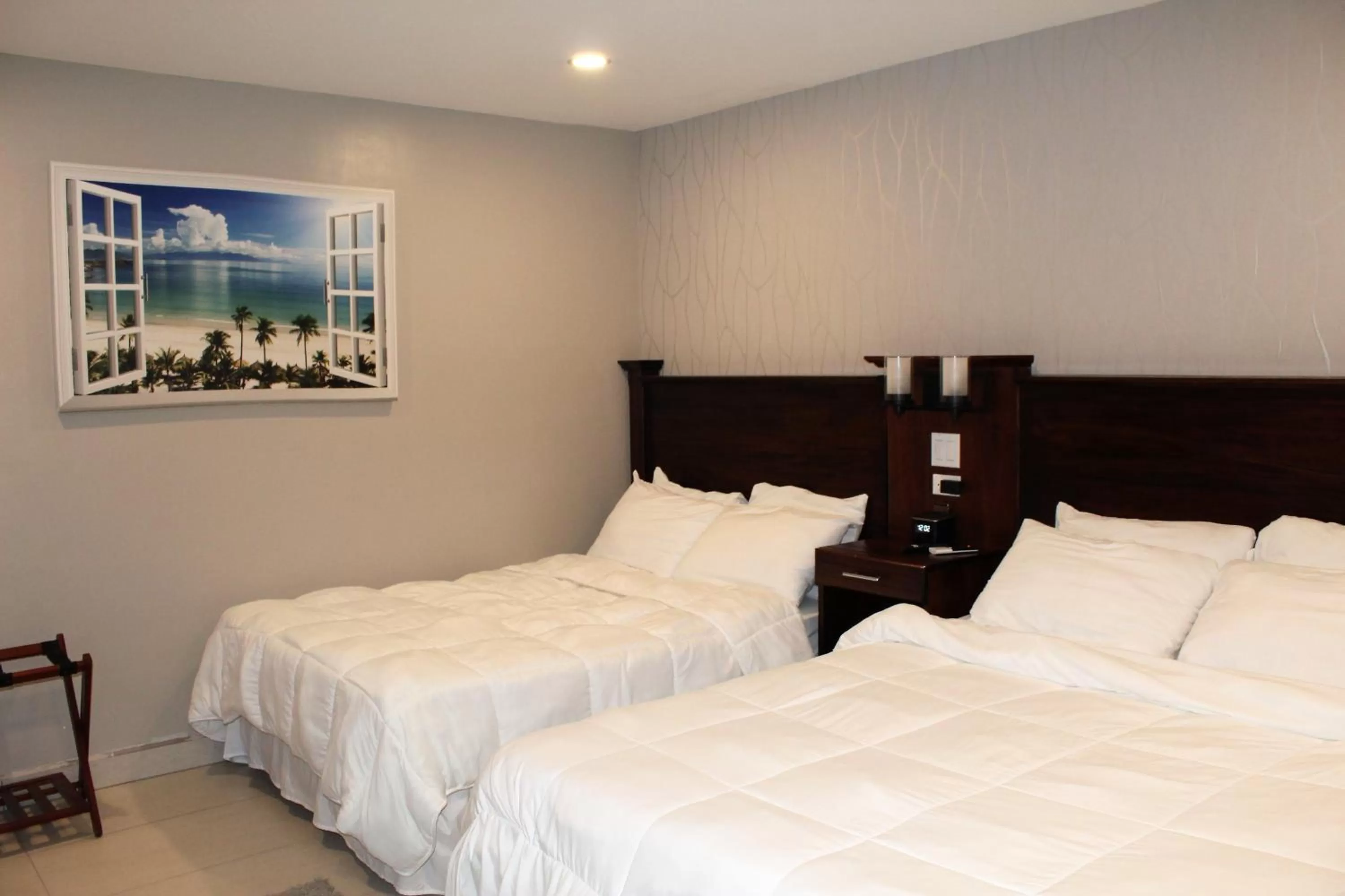 Bed in Barefoot Caye Caulker Hotel