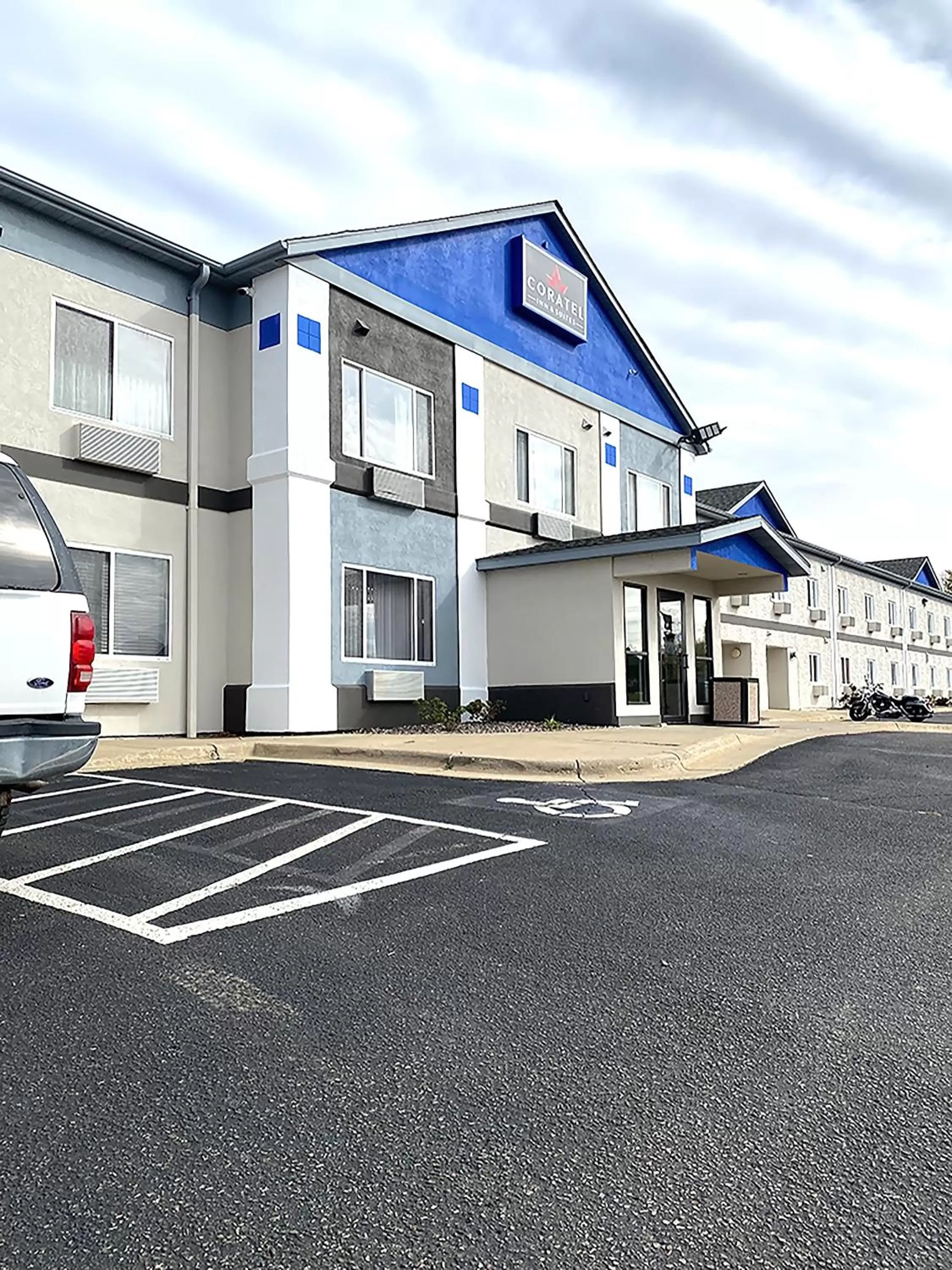 Property building in Coratel Inn & Suites by Jasper Northfield
