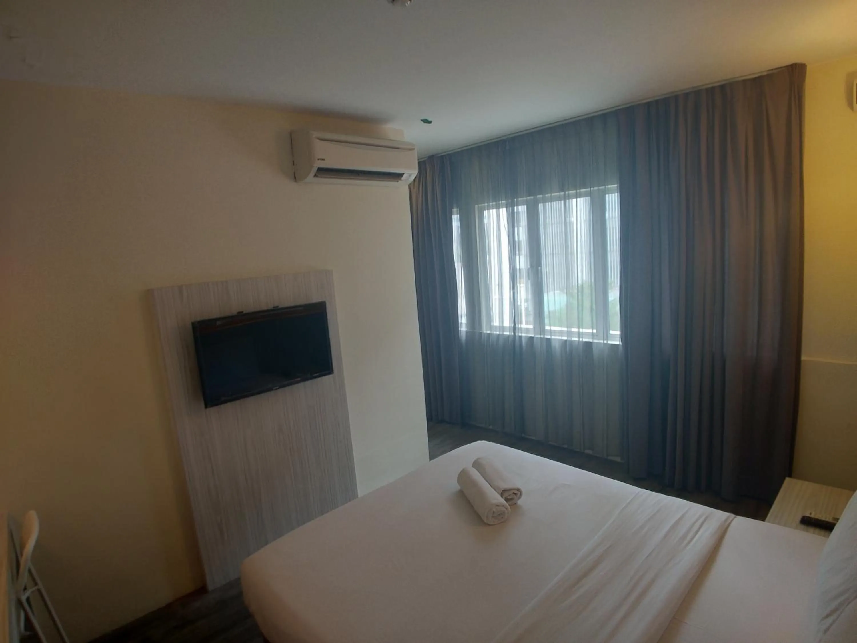 Communal lounge/ TV room, Bed in Hotel Westree KL Sentral