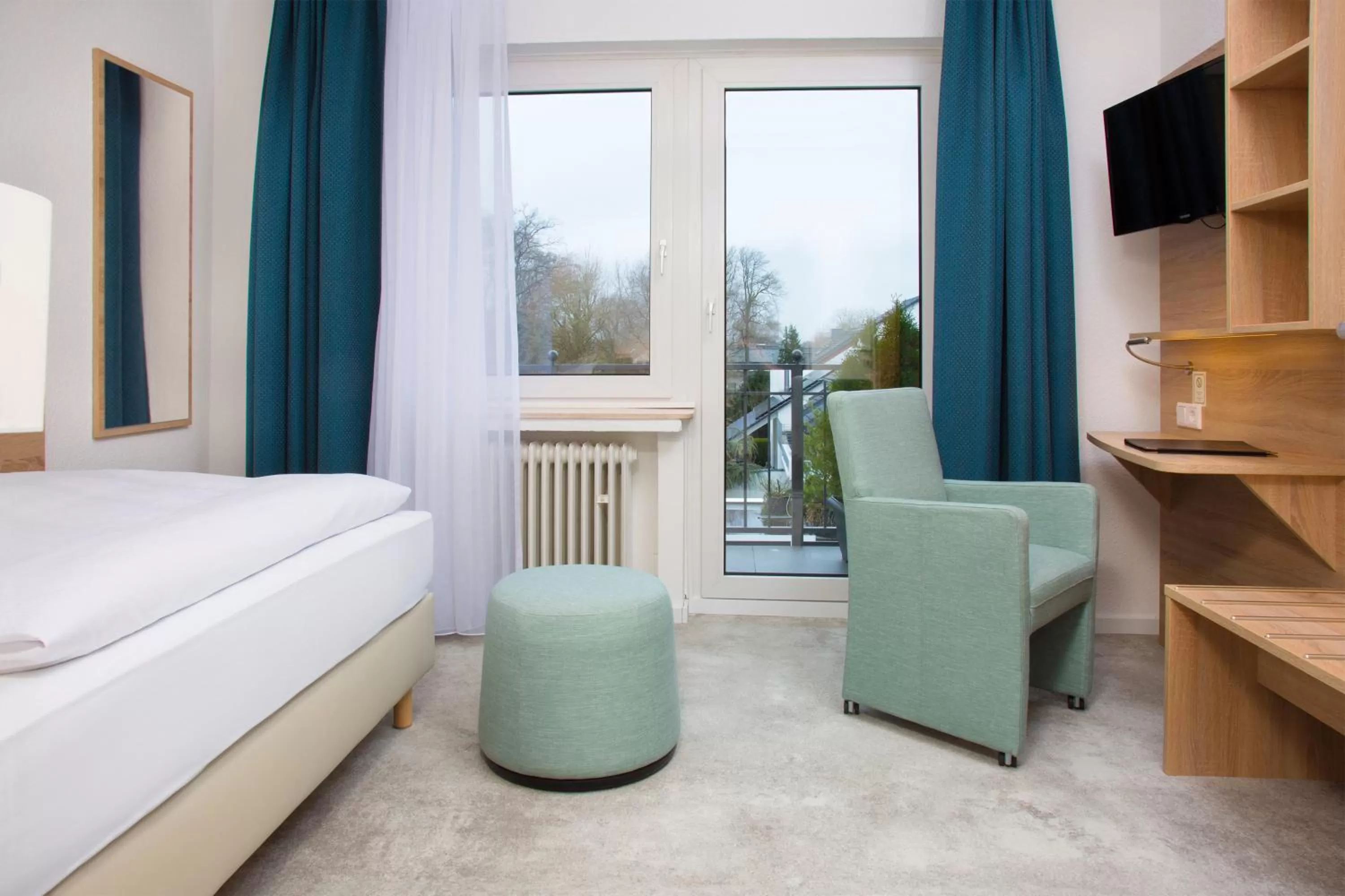 Photo of the whole room, Bed in Parkhotel Lippstadt