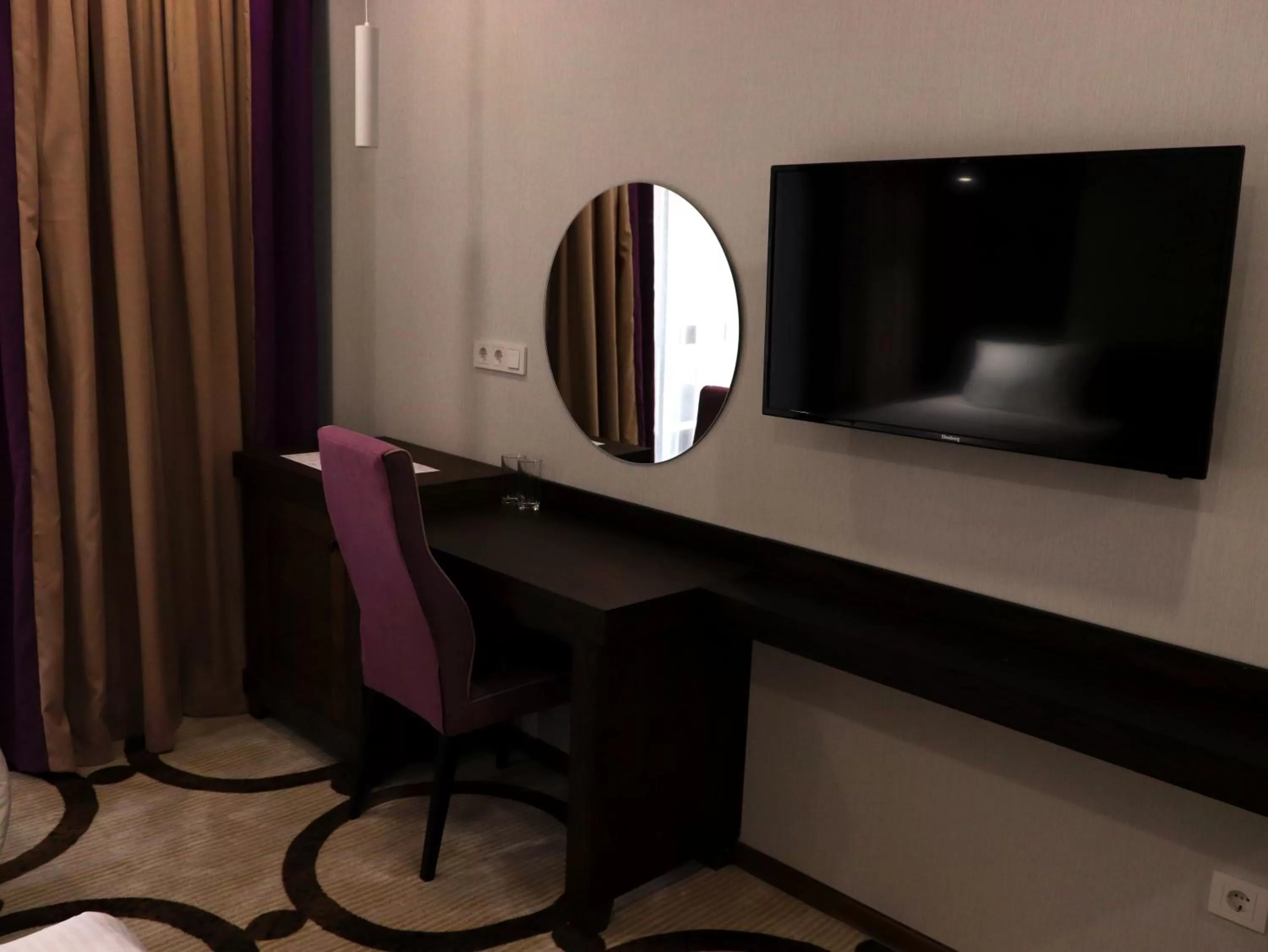TV/Entertainment Center in East Palace Hotel