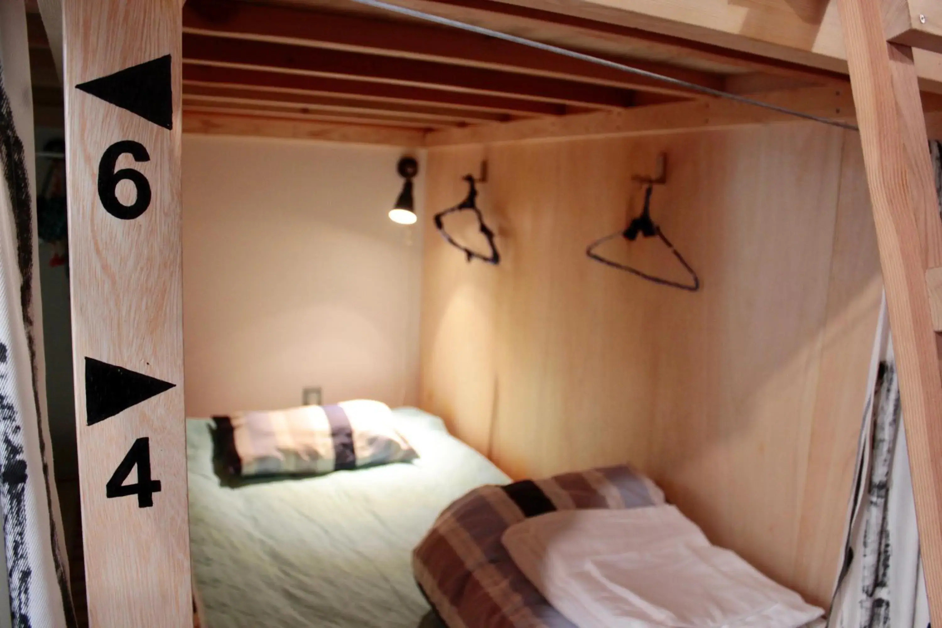 Bed in 8-Bed Mixed Dormitory Room in Kamagasaki University of the Arts Cafe Garden Guest House aka Cocoroom Bed in 8-Bed Mixed Dormitory Room in Kamagasaki University of the Arts Cafe Garden Guest House aka Cocoroom