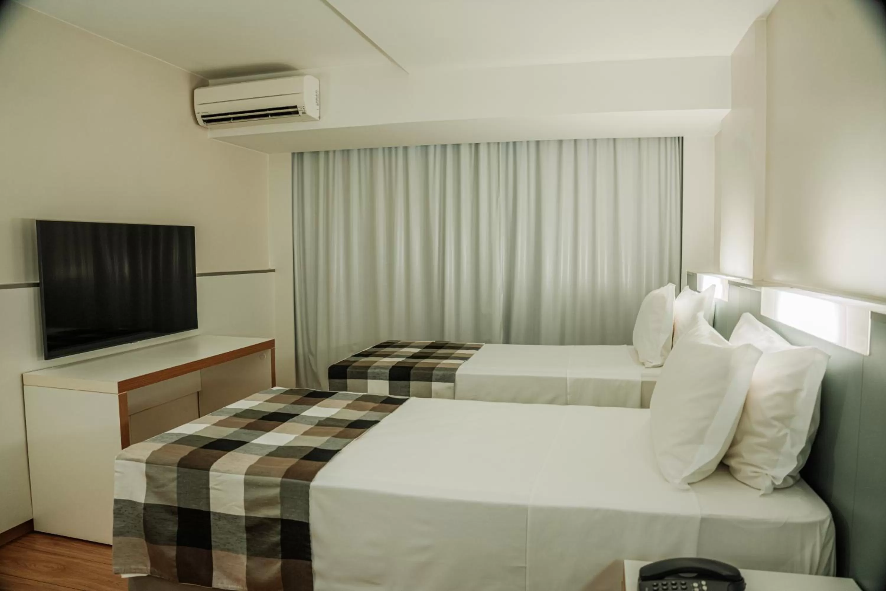 Bed in St Paul Plaza Hotel