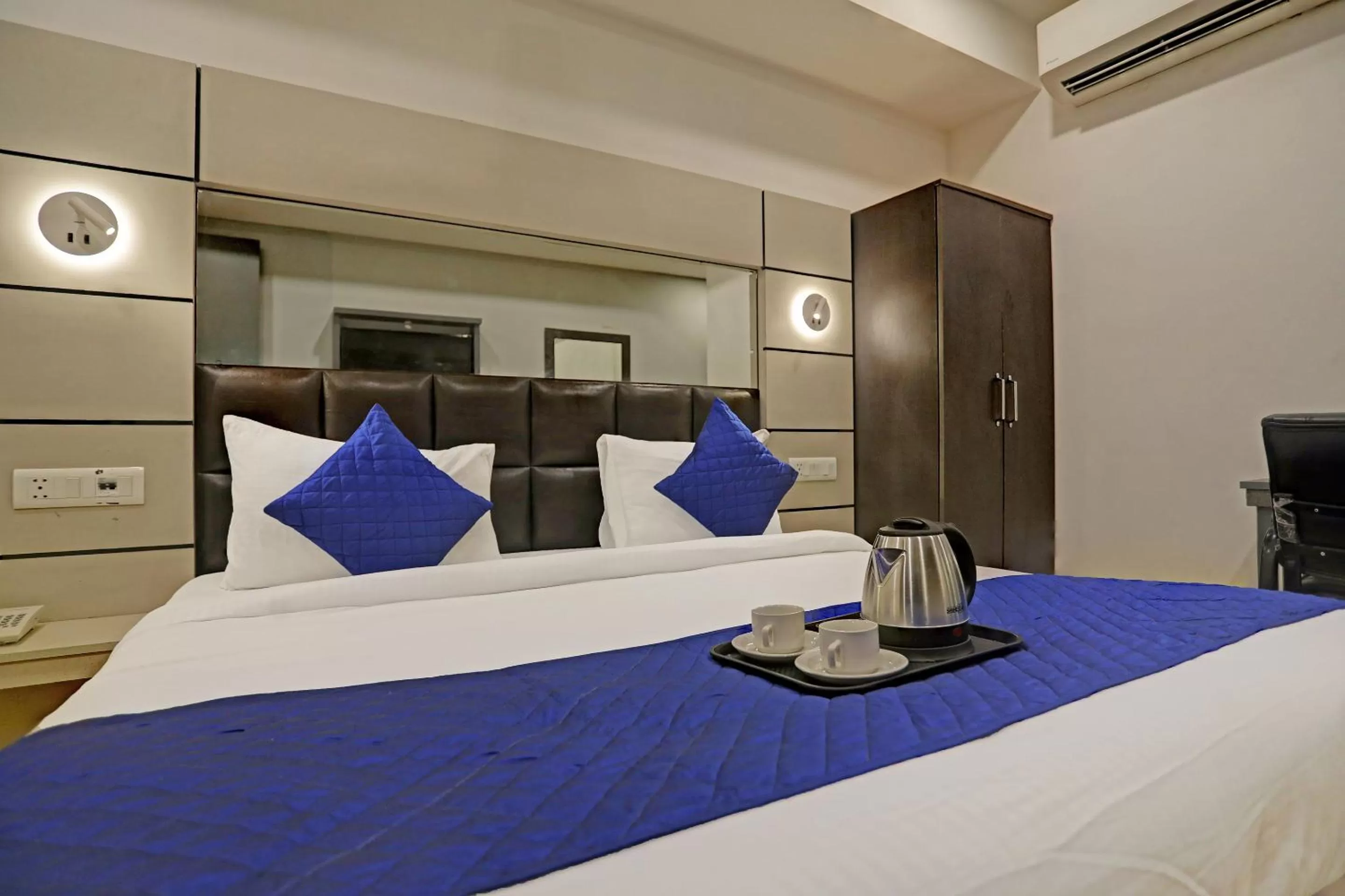 Bed in Hotel Royal Saffron By F9 Hotels