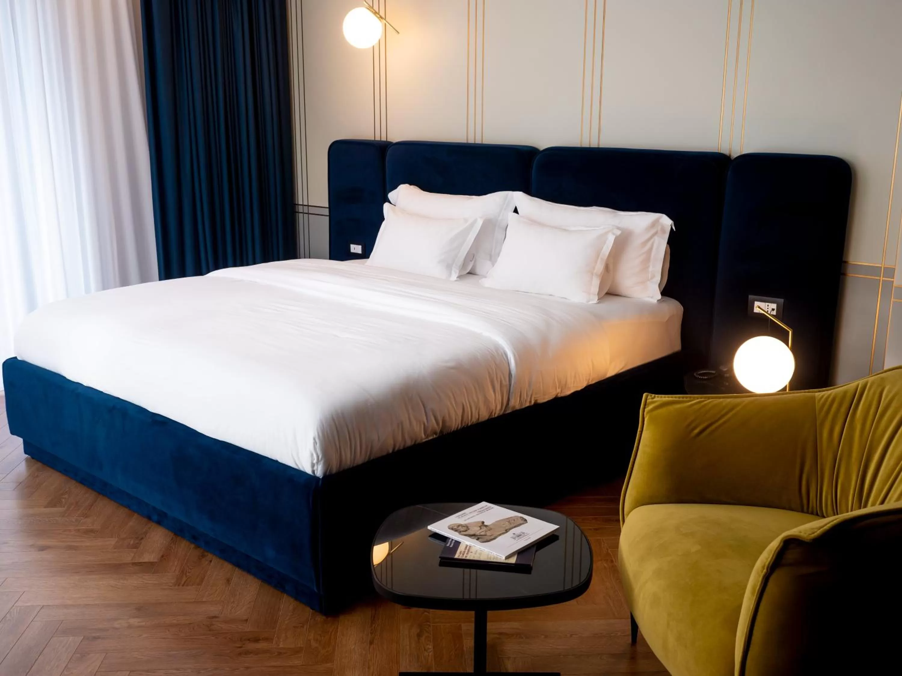 Bed in Moncafe BoutiqueHotel Spa