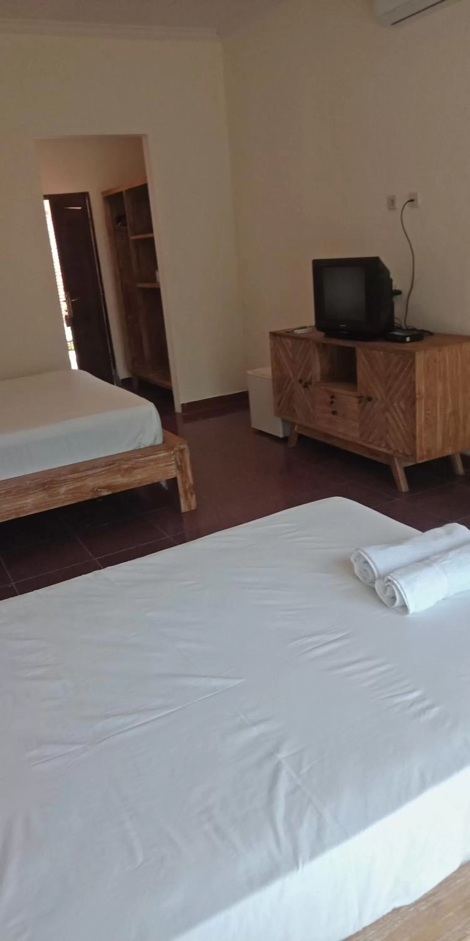 Bed in Nirwana Sea Side Cottages