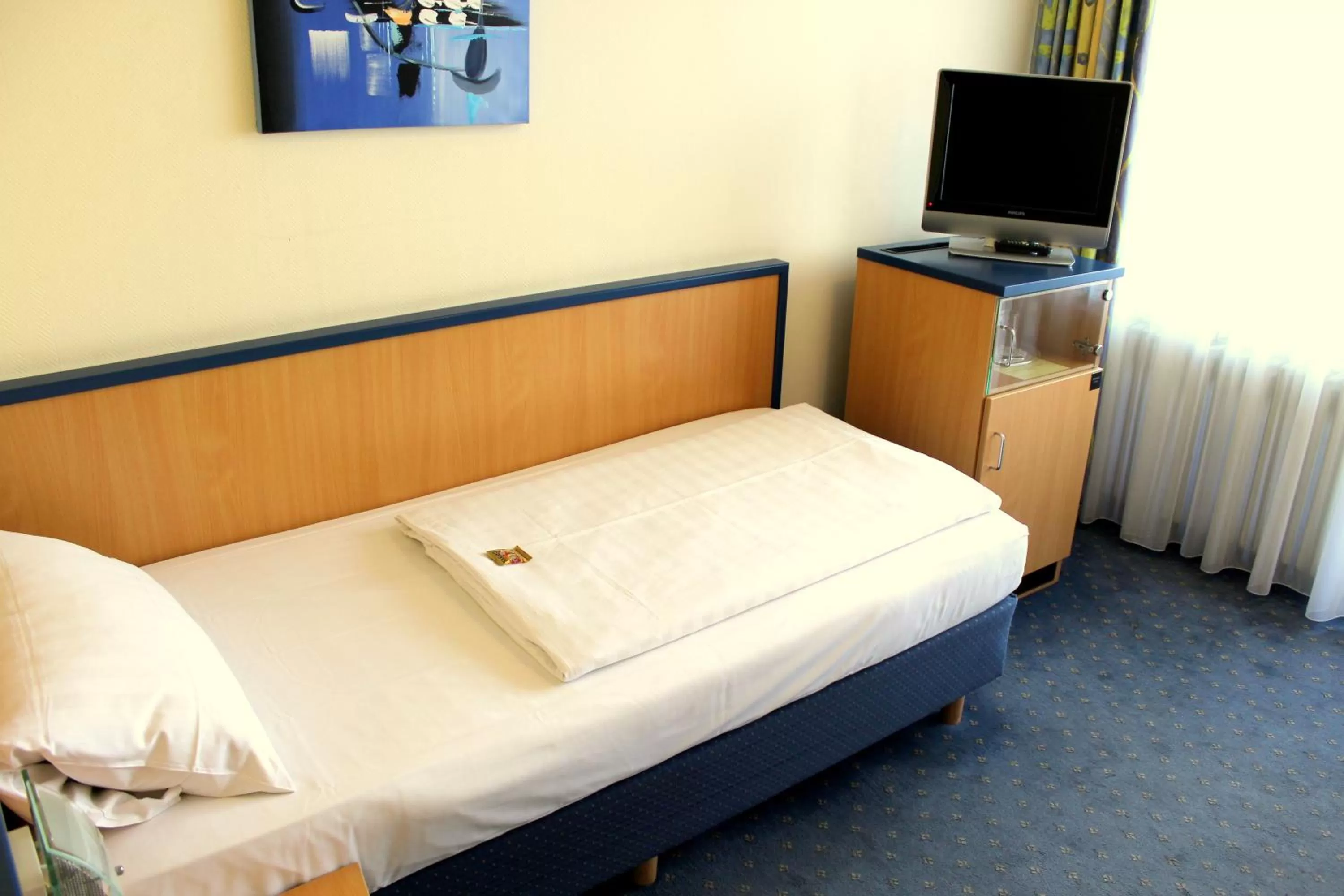 Bed in NP Hotel Wallis