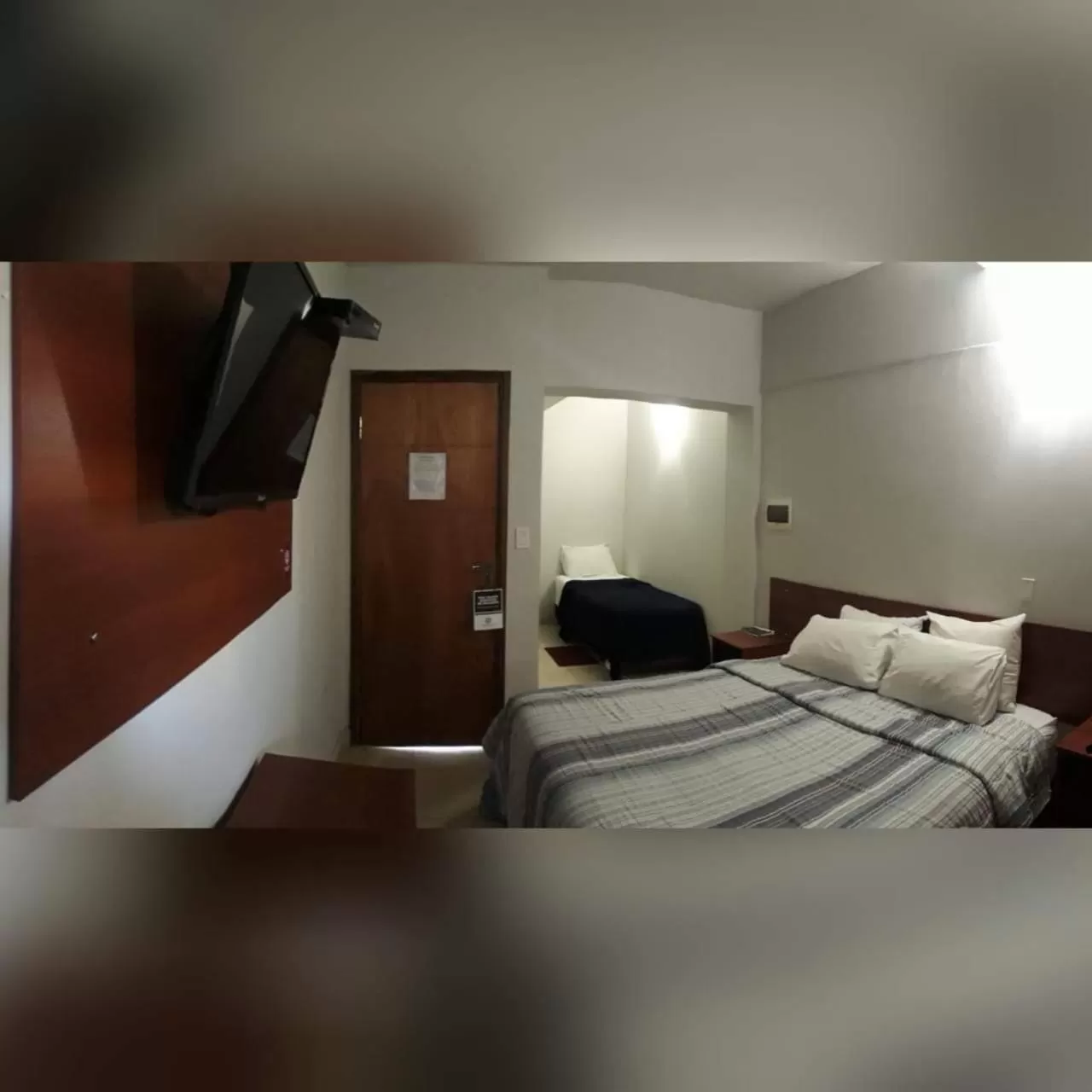 Bed in Madame Lynch Hotel Boutique