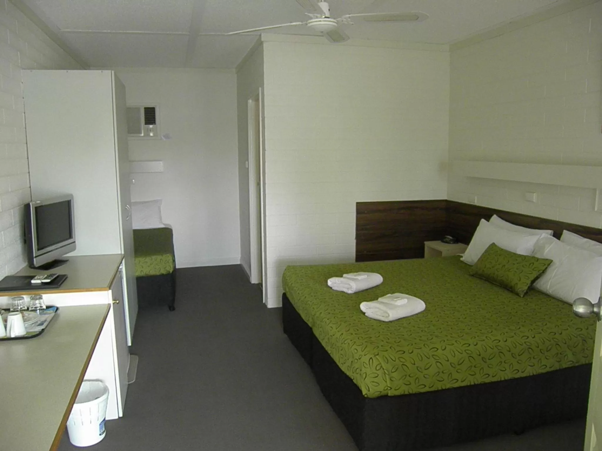 Bed in 7th Street Motel