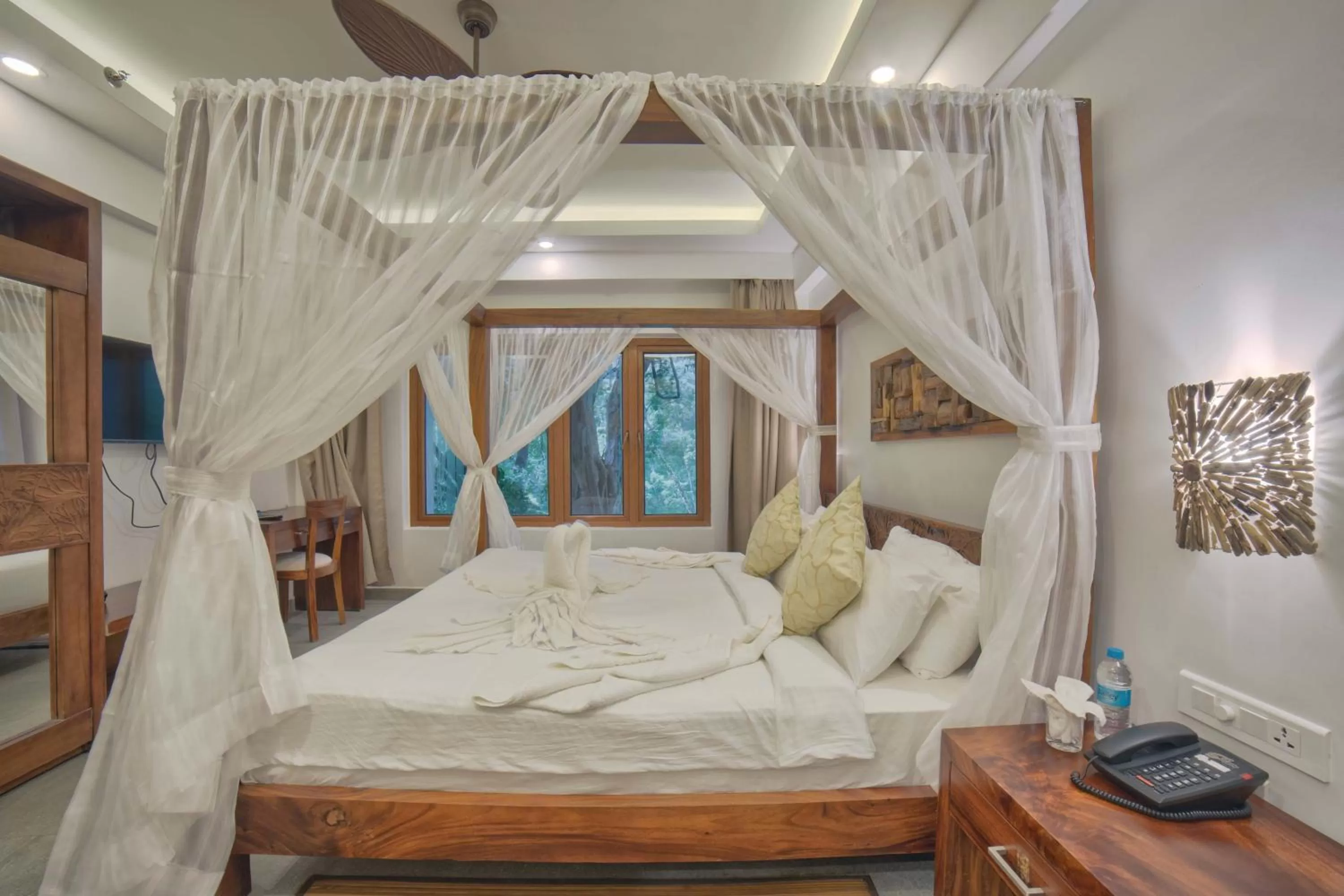 Bed in Elixir Hills Suites Resort and Spa