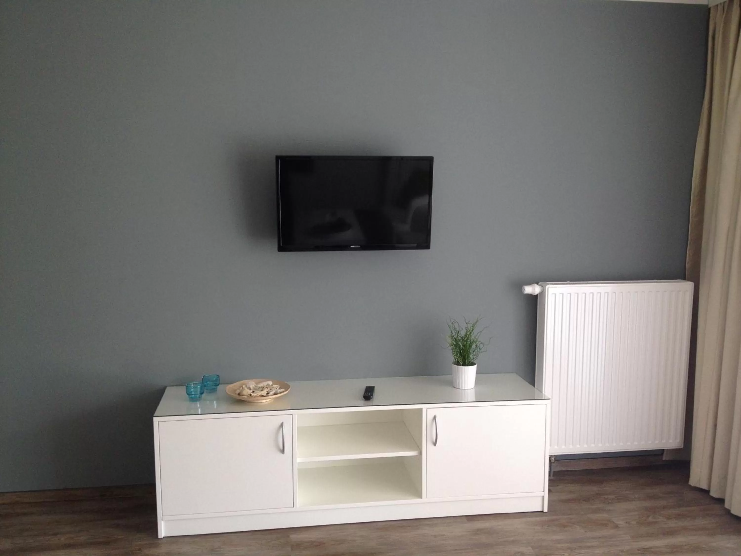 Living room, TV/Entertainment Center in Aparthotel am Heidensee