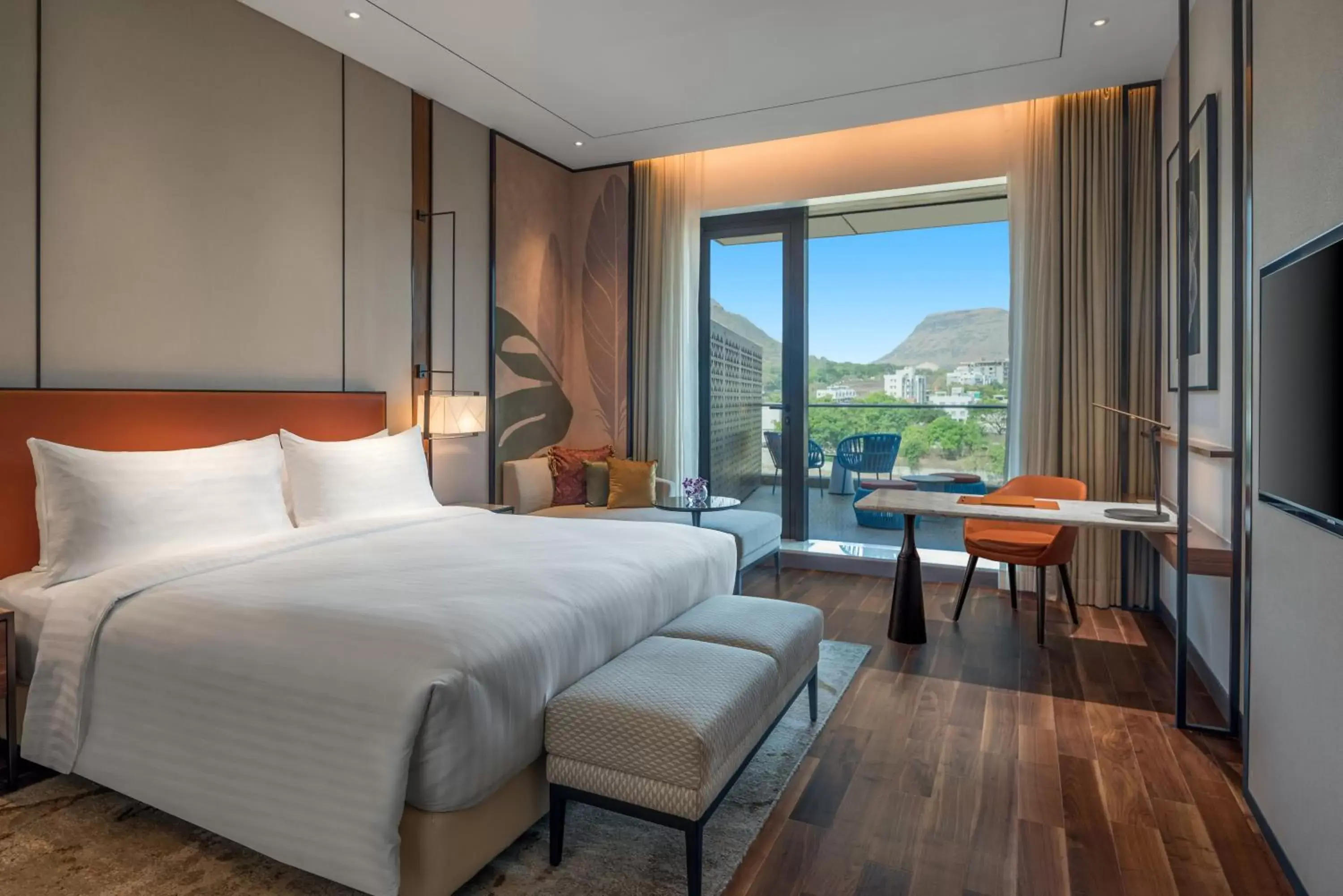 Deluxe Room with Balcony in Radisson Blu Hotel & Spa, Nashik Deluxe Room with Balcony in Radisson Blu Hotel & Spa, Nashik