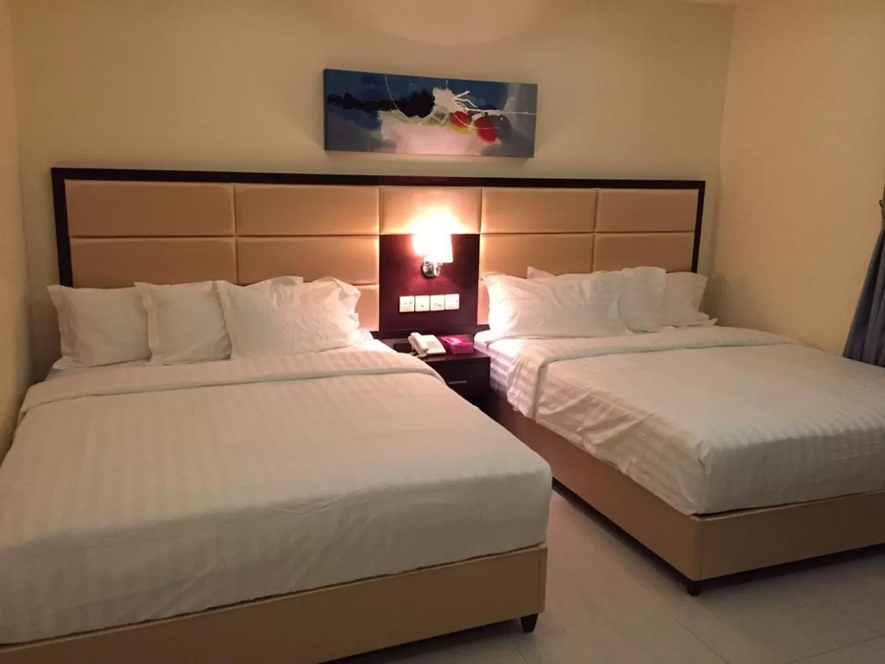 Bed in Arjaan Altakhassusi Hotel Suites