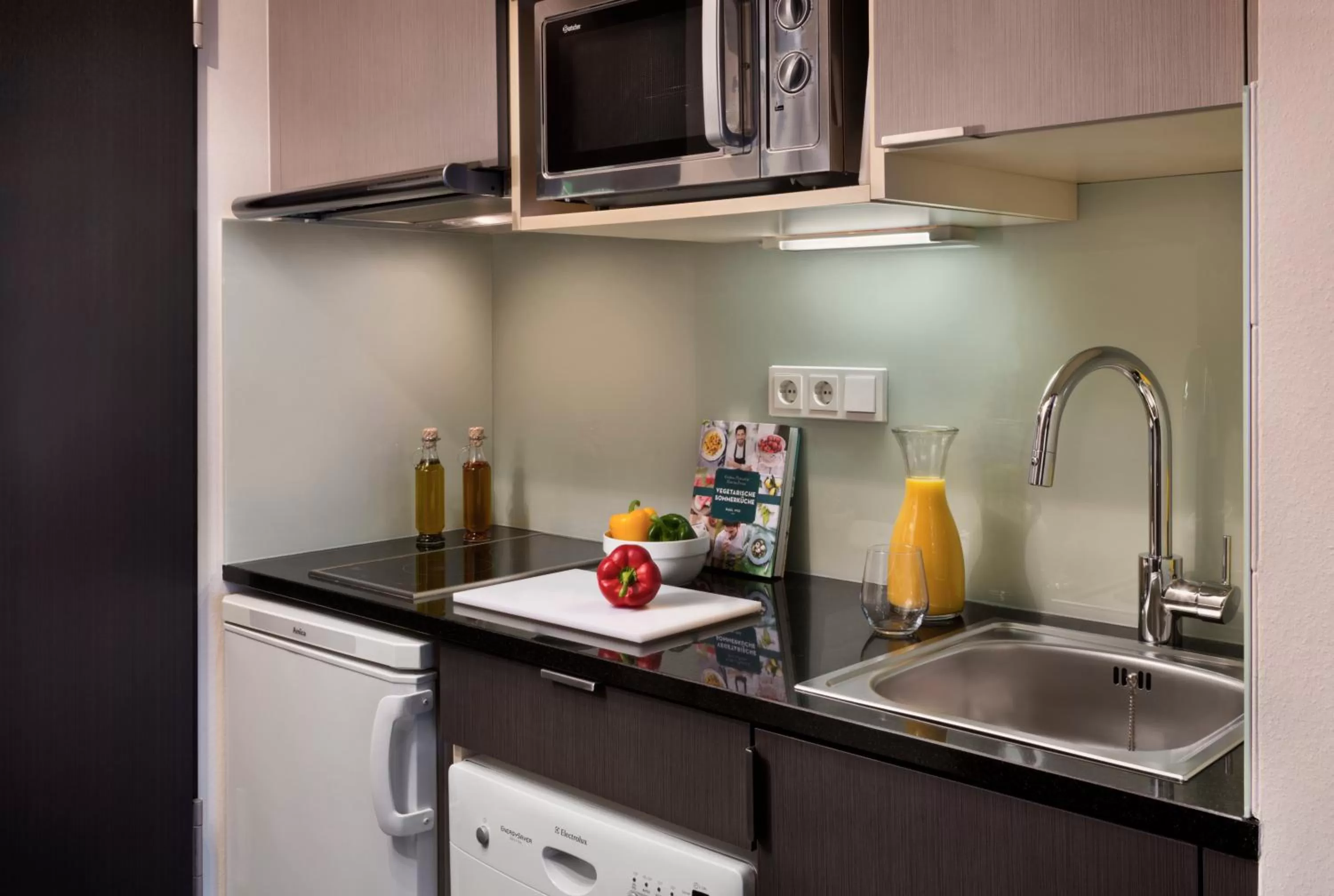 Kitchen or kitchenette in Citadines Arnulfpark Munich