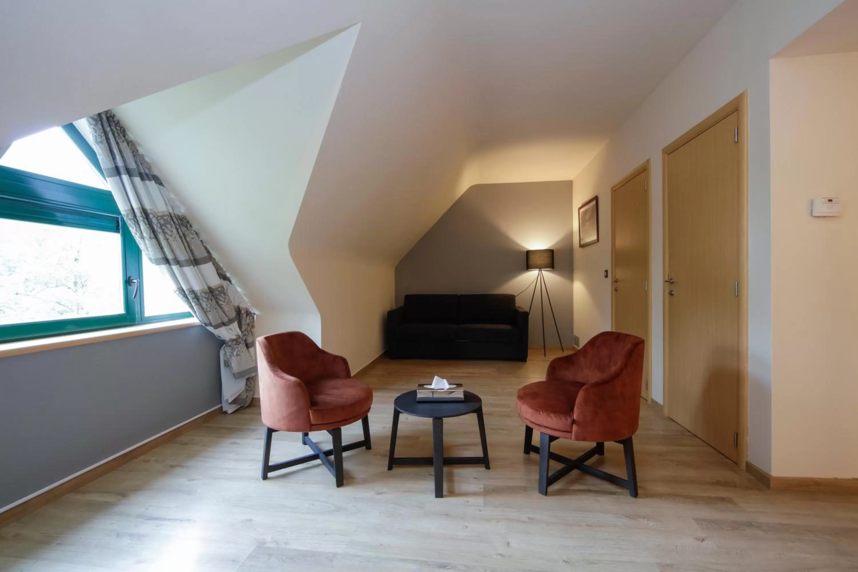 Seating area in Hotel Les Jardins De La Molignée