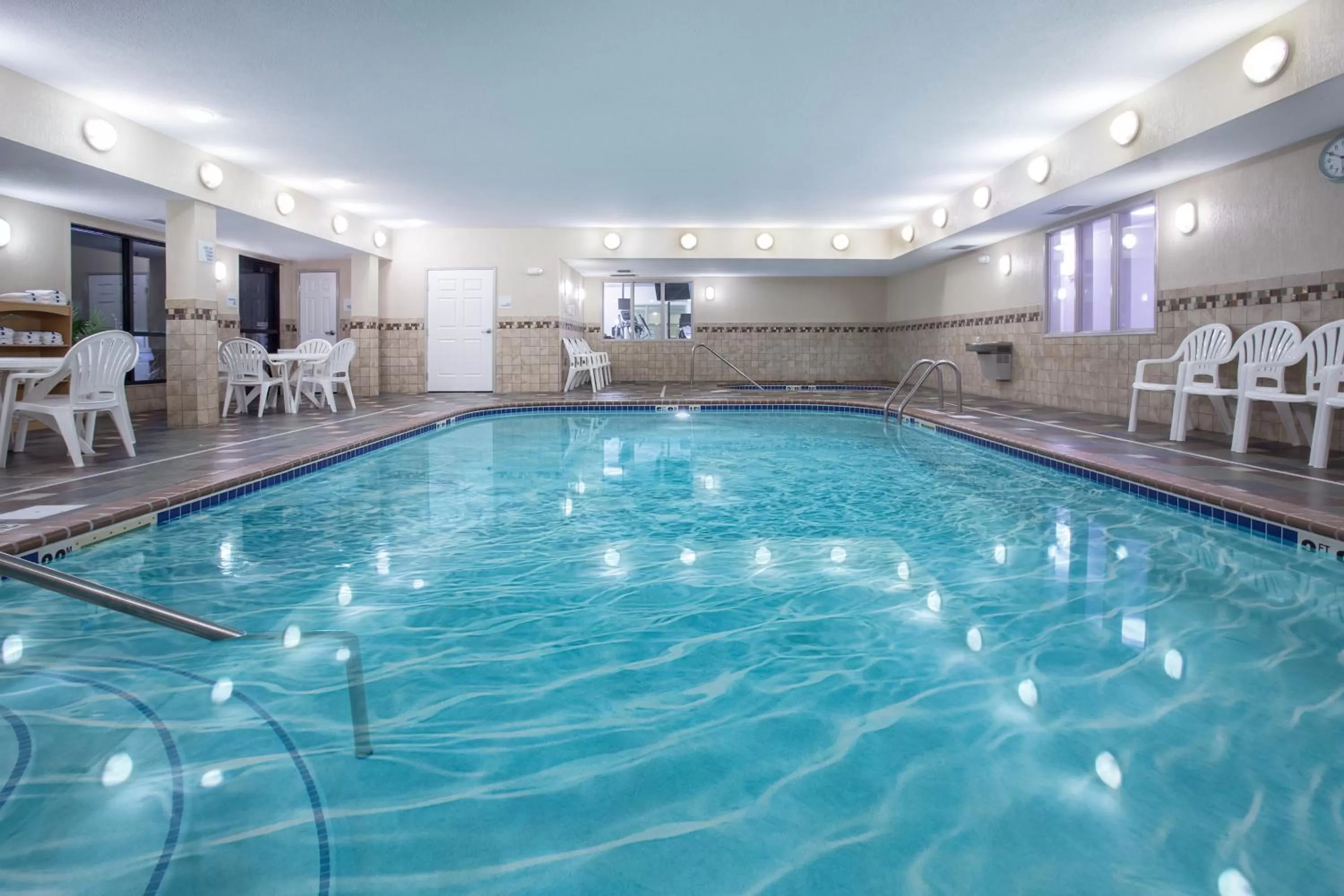 Swimming pool in Holiday Inn Express & Suites Ft Collins by IHG