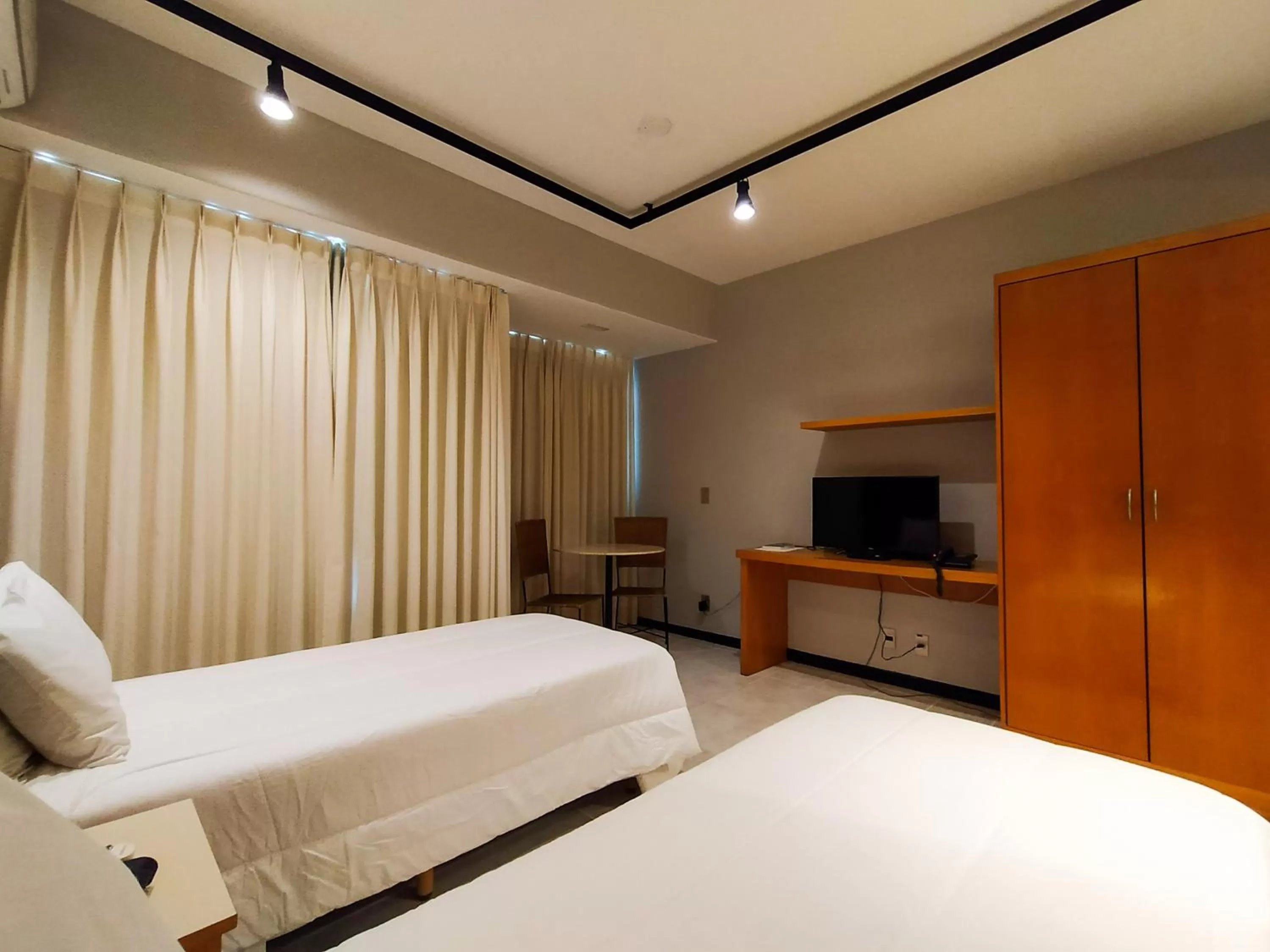 Bedroom, Bed in Savassi Village